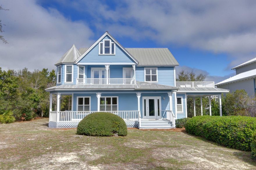 You will be amazed at this price and quality South of 30A. Privacy abounds sitting on a level 1/3 acre lot viewing neighboring Topsail State Park and the Gulf of Mexico. The wrap around porches are perfect for lazy days enjoying Gulf breezes and the smell of salt air. Interior is light and bright with multiple french doors and windows galore. 2nd floor viewing porch off bedrooms plus third floor perfect for kids, office or artist studio. Attached carport and storage room. Lot can accommodate a pool and separate guest house! Used as their second home,this family has lovingly maintained it over the years. Come make your lifetime of family memories here.