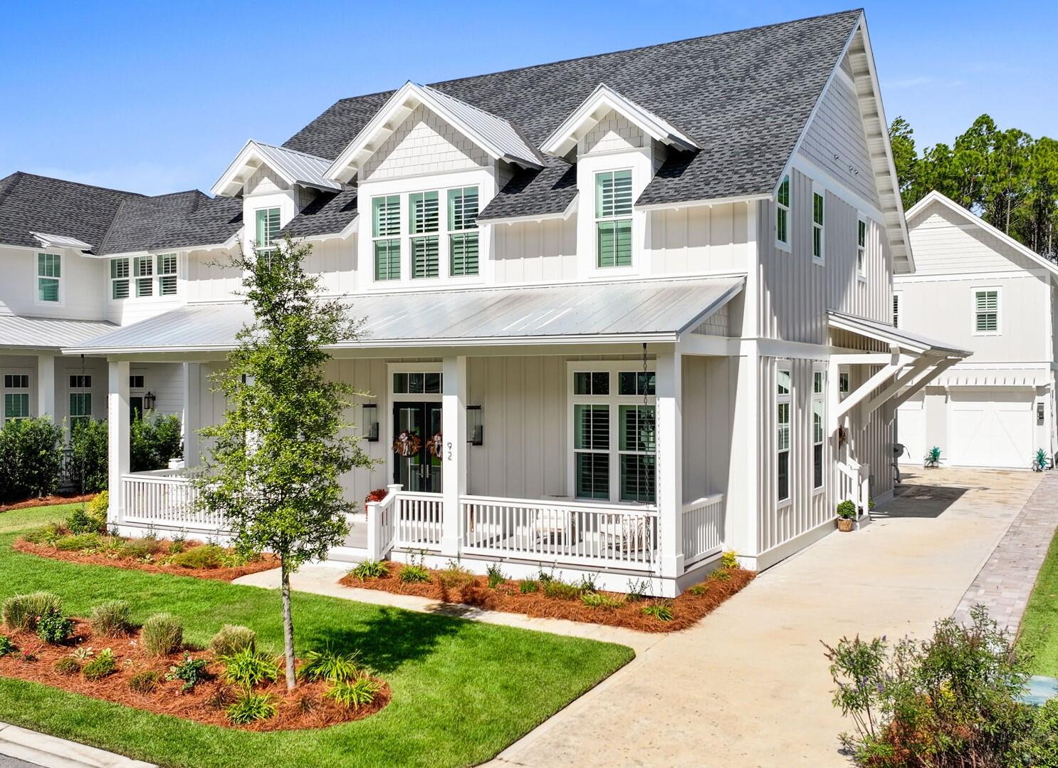 Discover this stunning luxury home located on a picturesque cul-de-sac street in the coveted Greenway section of Watersound Origins. This expansive property features 6 bedrooms and 5.5 baths, including a main home with five spacious bedrooms and 4.5 baths, complemented by a full carriage apartment that offers a cozy kitchen, living space, bedroom, and bathroom--perfect for guests or extended family.Inside, you'll find numerous upgrades, highlighted by soaring 12-foot ceilings and an oversized Taj Mahal kitchen island that serves as the heart of the home, ideal for culinary enthusiasts. The inviting living room boasts a beautiful fireplace, creating a warm and welcoming atmosphere. The master bedroom is conveniently located on the first floor and features direct access to the pool, providing a private retreat. All bedroom closets are walk-in closets, equipped with custom wooden shelving throughout for plenty of storage and elegance.
Step outside to your private backyard oasis, backing up to a serene preserve, ensuring tranquility and stunning views. The cabana features a fireplace for cozy evenings, while the inviting saltwater heated pool and hot tub offer the perfect way to unwind. The outdoor space is further enhanced by a built-in kitchen and a putting green, making it a dream for both relaxation and entertainment.
Additional features include an extended back porch and garage, along with a widened driveway providing ample parking and ease of access. This opulent home offers an unparalleled lifestyle in a desirable community. Don't miss your chance to make this extraordinary property yours!