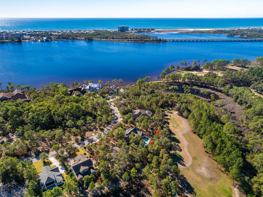 Set within the gated community of Wild Heron, this 0.23-acre homesite offers a rare opportunity to build a custom residence in one of Panama City Beach's most private and thoughtfully planned neighborhoods. Spanning more than 734 acres of protected natural beauty, Wild Heron is designed for long-term residential living, with short-term rentals not permitted, offering exceptional privacy and tranquility.Located approximately a quarter mile from the community's resort-style amenities, residents enjoy a heated lakefront pool and spa, fitness center, waterfront boathouse and pavilion, fishing dock, scenic boardwalks along Lake Powell, walking and nature trails, playground, and community fire pit. Wild Heron also features a marina with boat slips available for lease, providing direct access to Lake Powell for kayaking, paddleboarding, and boating. Wild Heron is home to the Shark's Tooth Golf Course, featuring a clubhouse with dining, bar and grill, locker rooms, and Har-Tru tennis courts. Golf club access requires a separate membership. This homesite presents an exceptional opportunity to enjoy a refined coastal lifestyle where luxury, nature, and privacy seamlessly coexist.
