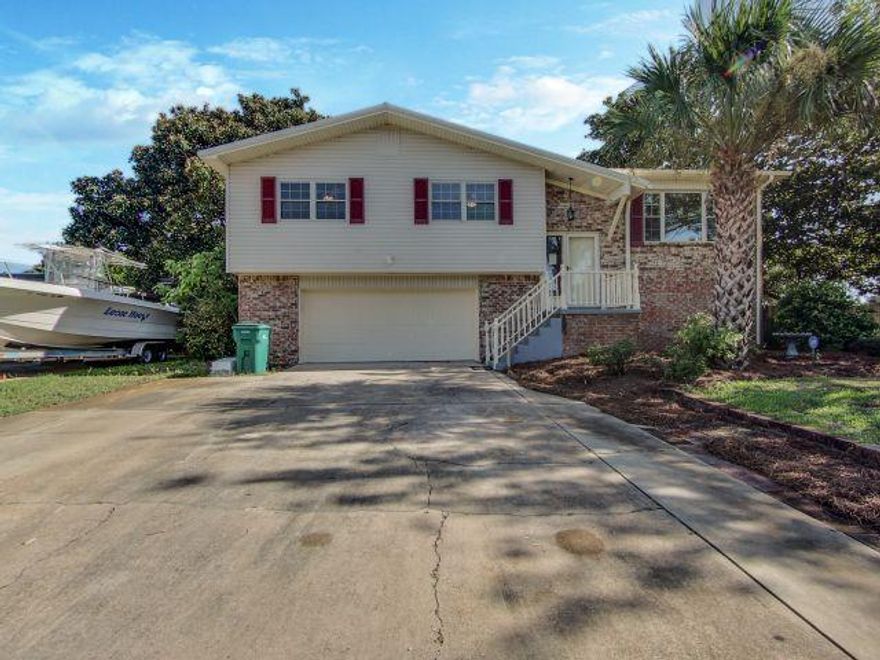 Newly remodeled 3 bedroom 2.5 bath home in downtown Destin. The house has been updated with a Metal roof, double pain windows, Copper wiring, Newer A/C and Heat. The kitchen has been updated with new cabinets, granite countertops, new Stainless appliances, new lighting, and new tile flooring. All 3 bathrooms have been updated with new vanities, new mirrors, new lighting, new tile flooring, and new toilets in the upstairs bathrooms. The whole house has been updated with new baseboards, new doors and hardware, new paint and new fans and lighting. The downstairs was updated with waterproof LVT flooring, and drywall. There is a large new deck on the back of the house, a 12 X 20 work shop on the back of the garage. The pool has been refinished with a gunite bottom and newer pool pump and filter