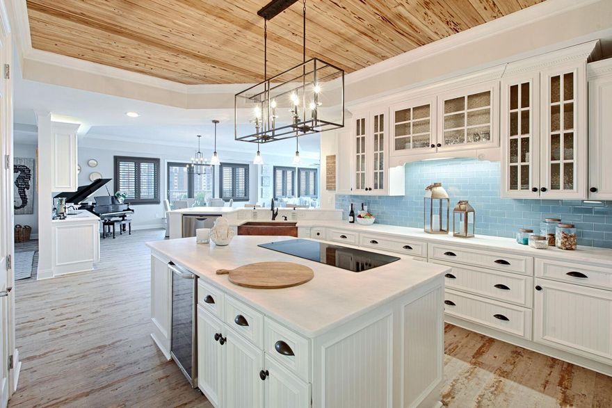 Renovated Corner Penthouse features expansive views of the Gulf, East Pass, Destin Harbor, Crab Island, Choctawhatchee Bay, & the tree top canopies of Destin. This stunning waterfront condo was completely renovated in 2020 and offers 4 bedroom with ensuite bathrooms. One of the bedrooms has been converted into a cozy den. This unit has 2 balconies that wrap around and offer abundant space for entertaining, watching wildlife, gardening & the most spectacular sunsets. Completely renovated which includes beautiful new honed marble kitchen counters, shiplap, pecks cypress ceilings, new flooring, paint, & cabinets, surround sound, outside speakers and separate storage locker & 2 dedicated covered parking spaces. There is also a Marina on siteWalk to restaurants, bars