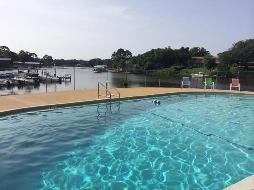 THIS UNIT HAS A NICE REHAB AND UPDATED. TILE FLOORS THROUGH OUT WITH WOOD GRAIN TILE IN LIVING ROOM. KITCHEN HAS UPGRADED CABINETS WITH SIDE BY SIDE REFRIGERATOR/FREEZER. STACK PACK WASHER AND DRYER CONVEYS WITH THE UNIT. THIS IS CONVENIENT TO BOTH HURLBERT AND EGLIN. PERFECT TO LIVE OFF BASE WITH A ROOMMATE TO SHARE EXPENCES. OWNER COULD LIVE THERE FREE AS BAH AND RENTER SHOULD COVER EXPENCES. THE COMPLEX OFFERS BOAT SLIPS ON A FIRST COME FIRST SERVE BASIS********* SPECIAL OFFER******