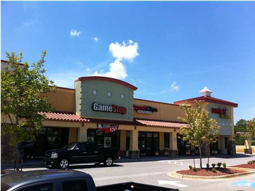 The Marketplace at Tiger Point is a 25,568 square foot, Class A retail development located along Florida's booming Panhandle in Gulf Breeze. Located just 8 miles east of Pensacola and adjacent to Super Walmart and Lowe's, The Marketplace at Tiger Point enjoys a regional draw attractive to national and local retailers alike. The site is situated directly on Highway 98, which offers traffic counts in excess of 40,000 cars per day. Current tenants include Shane's Rib Shack, Gamestop and Anytime Fitness. The asking rent is $14/SF (Base Rent)+ $3.96/SF (NNN). Please feel free to make us an offer.