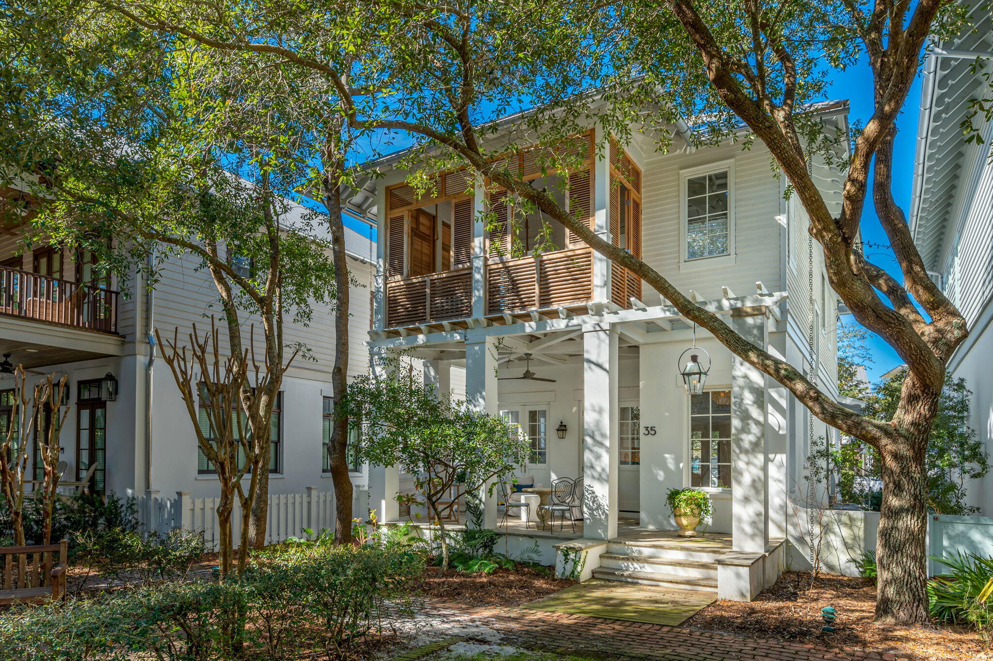 Meticulous attention to detail has been given to every aspect of this stunning 3 bedroom, 3 bathroom home in Rosemary Beach. An ideal floor plan creates a relaxed flow, and numerous large windows and doors provide an abundance of natural light while overlooking the neighborhood green space. On the first level, the great room opens to a well-appointed kitchen, complete with quartz counters, and top of the line cabinets and appliances. To the rear of the residence, a spacious porch leads to the home's private courtyard.  On the second level, a roomy master bedroom, with an ensuite bathroom and large closet, opens to a private porch.  A bunk room, guest suite, and full bathroom are also located on the second floor.