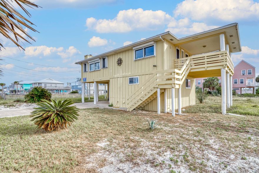 TREMENDOUS WATERVIEWS from this Gorgeous 4 Bed, 2 Bath, 1716 Sq Ft, BEST DEAL ON THE BEACH Home that sits on a Large .34 Acre Lot. Situated Less than 500 FT from the Gulf of Mexico's Beach Access, Gorgeous Emerald Hued Waters and Steps from the Santa Rosa Sound, It's Easy to Enjoy All Your Water Activities, Relaxation, and Fun in the Sun! This Home is Fully Furnished with Tasteful Beachy Decor and Makes an Excellent Vacation or Secondary Home with Great Rental History. It's Also Spacious Enough to be Wonderful Primary Home. There's Plenty of Views to Admire of Both the Santa Rosa Sound and Gulf of Mexico. Outfitted with Two Main Entrances, One Upstairs and One Downstairs, Great for Additional Guests and Rentals. Catch Unforgettable Sunrises & Sunsets from either of the 2 Decks
