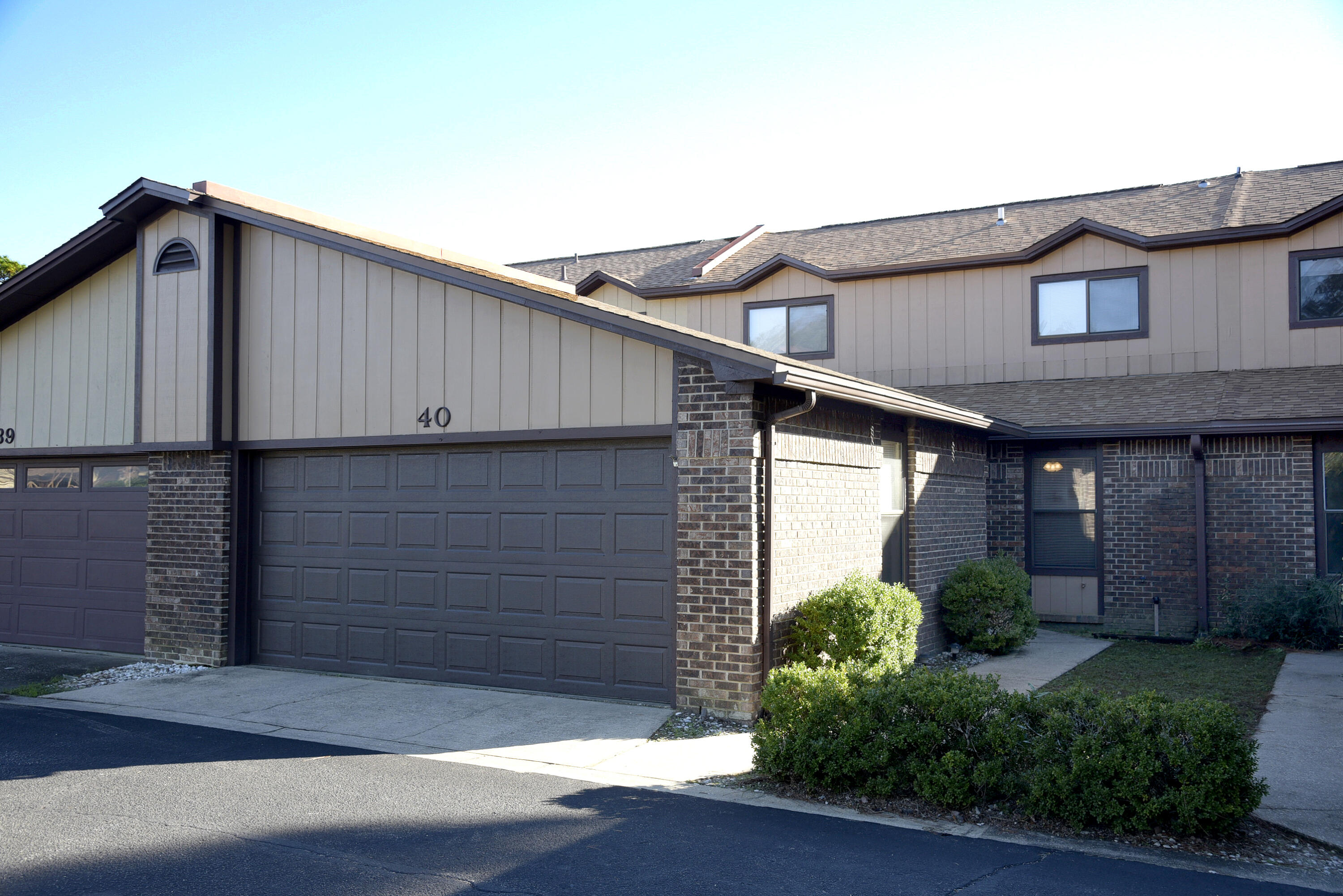 You'll love this spacious townhome in the serene community of Hidden Cove.The open floor plan features an efficiently designed kitchen with pass through to the dining area/great room featuring vaulted ceilings, a stone accent wood burning fireplace and luxury vinyl plank flooring. Two sets of sliding glass doors open to the long covered porch overlooking the pool area. A half bath, laundry room and master bedroom are also conveniently located on the first floor. The master bedroom has luxury vinyl plank flooring and an en suite bath. Upstairs you'll find a loft overlooking the great room as well as two additional bedrooms and a full bath. An extra bonus is the full two car garage with pull down stairs to access the attic. Enjoy all the amenities of Hidden Cove - a pool, tennis courts, community dock, boat slips available for rent on a first come first served basis and gorgeous views of the bayou. HVAC 2014 and HWH 2015. Call today for your appointment to view this special property!