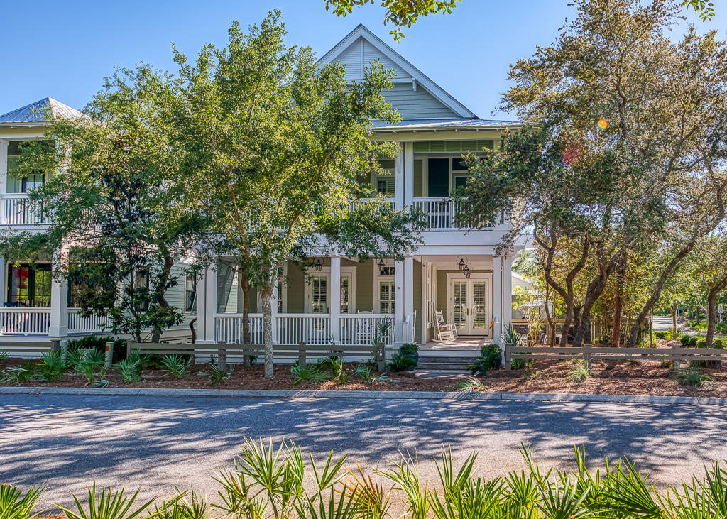 This gorgeous, never-rented beach house sits majestically on an oversized corner lot in Phase III of WaterColor exuding elegance in both form and function. Masterfully designed by Chris Stoyles and expertly built by the team at CORE Construction, the expansive floor plan and detail-oriented finishes provide nuances rarely seen in coastal-infused properties in this popular community. The exposed brick entry and hand-hewn repurposed beams add natural contrast to the crisp and contemporary shiplap walls throughout the lower level of the home. New renovations have brought in a fresh backsplash and hand-selected granite countertops to the entire state-of-the-art gourmet chef's kitchen, outfitted with a 48-inch Thermador range with double ovens and an oversized center island and breakfast bar...