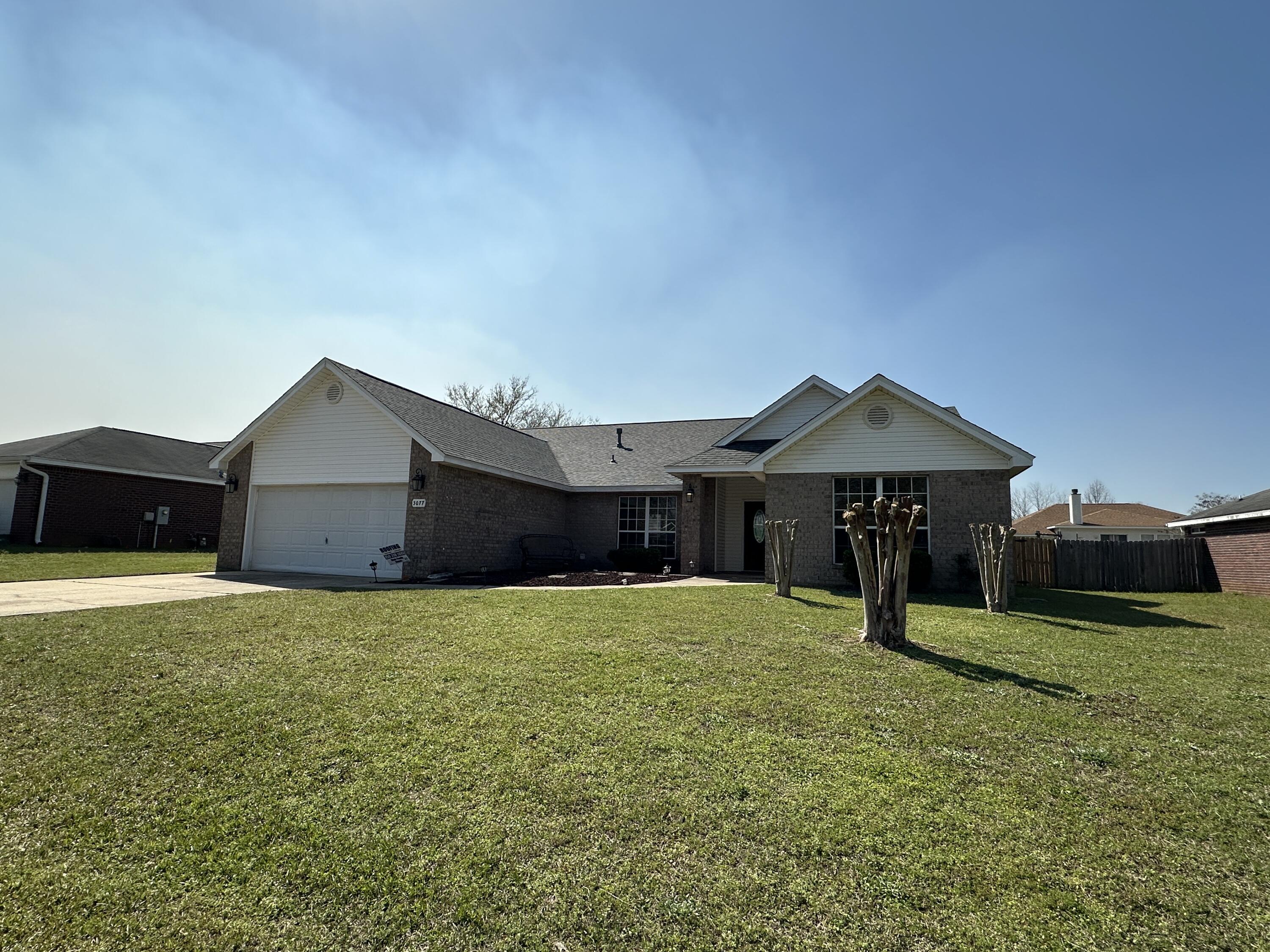 Seller will pay $8000 towards Buyer Closing Costs. Beautiful, spacious home in north Crestview. This subdivision has community swimming pool and tennis courts for you to enjoy. New roof was installed March 2025. The home features a spacious open floor plan, gorgeous tile flooring, a corner fireplace in the family room, and some wood laminate. It's a split bedroom floor plan with a large master bedroom and bathroom. There's a formal dining area, as well as a breakfast area, privacy fenced back yard and easy maintenance brick siding. Come see it today!