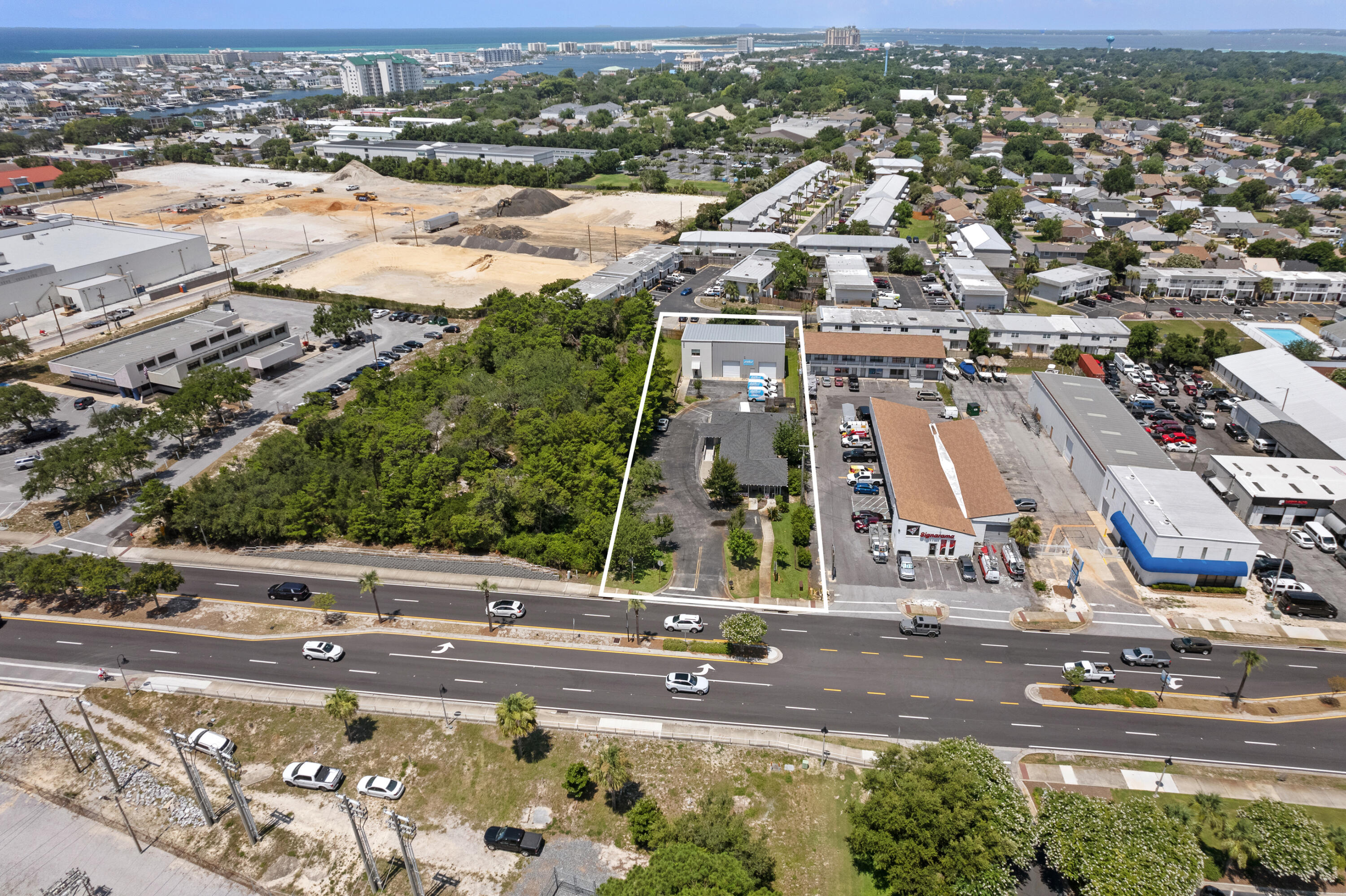Now available for purchase is 209 Main Street in Destin, FL. Located in the heart of the city, this property offers a buyer a tremendous opportunity to create a flexible mix of uses onsite. The total square footage is split between a 2,580sf office/retail/showroom while the balance of 3,948sf is held in a recently completed flex building with 1,848sf of finished office space on the first floor and a finished second floor mezzanine live/work space. The insulated warehouse contains 2,100sf with approximately 24' eave height and two 12' roll-up bay doors.This property is located near the newly developed Publix shopping center and the Destin Harbor district along with clear access to Highway 98 and Airport Rd. Additional documentation is available upon request.