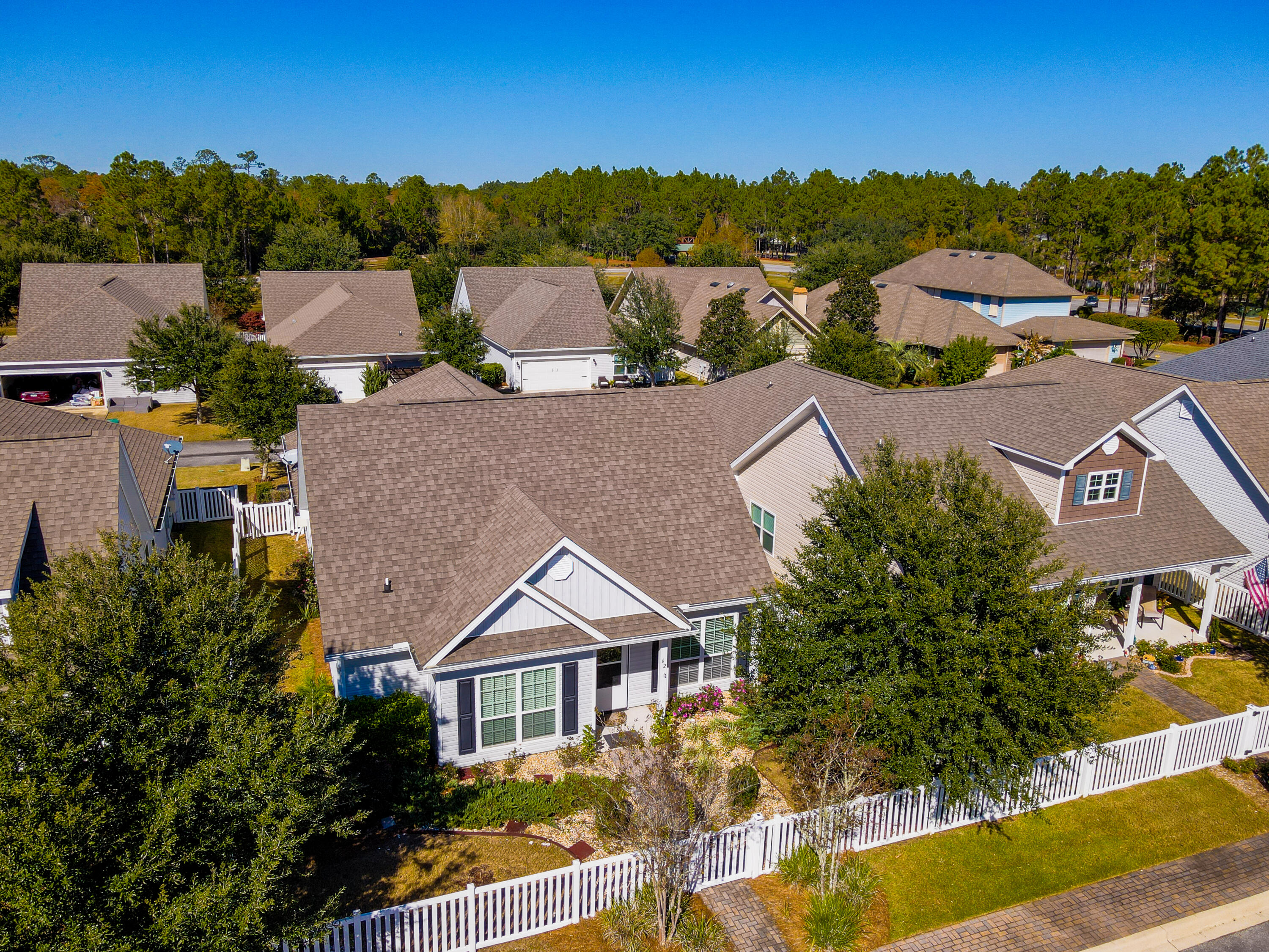 Located in the sought after Hammock Bay. Which features resort like Pools, Movie Room, 24hr Gym, General Store, Tennis Courts, Basketball courts, playground, Dog Park, Bay Club, and Fishing Pier. Schooner landing also includes all yard Maintance with HOA dues. Don't miss your chance to snag this amazing property, priced to sell. All new high end flooring has been upgraded in the main living area and hallways. Also features all new painting through out. ( even the doors, trim, and ceiling) This home has an open concept kitchen, dining, and living area. Great for entertaining. It has 3 great sized bedrooms, 2 bathrooms, Fenced in front yard, and a 2 car garage. (That even has a pull down screen to enjoy as a nice patio). It's a blank slate ready to put your touches on.