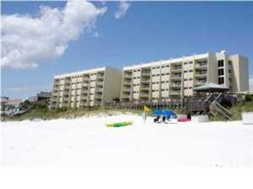 Spectacular views of the Gulf of Mexico from this great 2bd/2ba at the Beach House. This unit features a beautiful updated kitchen with granite counter tops, subway tiles and stainless appliances as well as tile in the living area, crown molding and updated bathrooms. The Beach House is a hidden gem on the beach and is great for a second home or investment unit. You will enjoy the quaint feel of a low rise building with expansive beach frontage that is never crowded. Conveniently located to groceries, shopping and all Destin has to offer. All dimensions to be verified by the buyer.