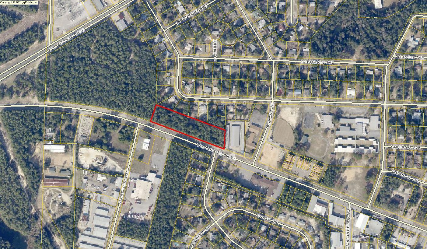 Vacant commercial parcel conveniently located near Eglin AFB. Neighboring businesses include: Coca-Cola Bottling Company, City of Valparaiso, storage facilities, light manufacturing.