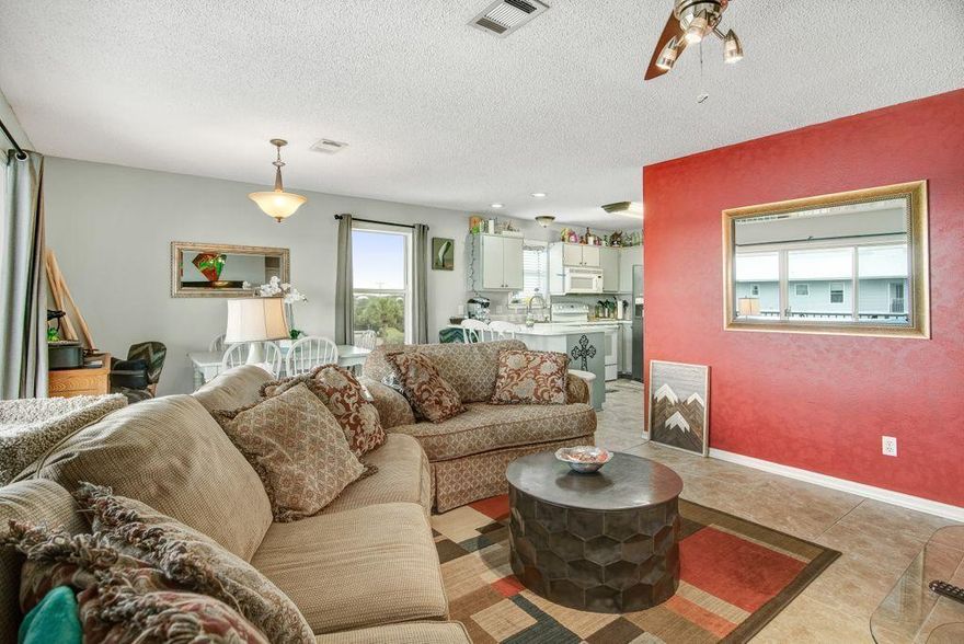 This will answer all your desires to want to live near the Beach, swimming pools, tennis court and great neighbors, living in Beachside Villas Condominiums. Located on the top floor of Building 11, this lovely unit is next door to the heated Swimming pool and host wonderful views from the balcony over the lake in rear of building and the tennis courts! This unit is being offered unfurnished. Beachside Villas has two community pools and a great area in back with tennis courts and shuffleboard. Majority of the people that come to the beach, enjoy staying here because it is so close to the Eastern Lake Inlet and the public beach walkover to the Gulf.