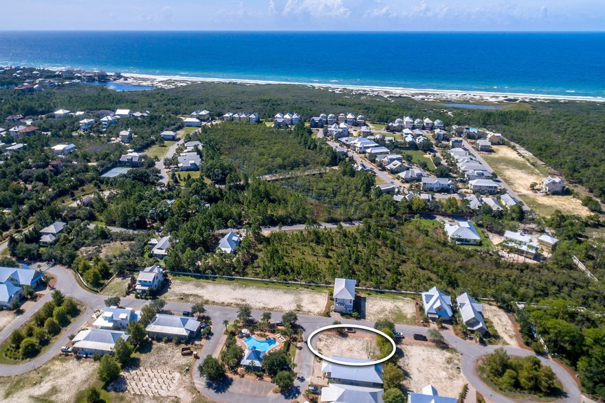 Corner lot located in the beautiful community of Cypress Dunes. This home site is the perfect location in Phase II across from the community pool. Choose from existing John Willis floor plans or have your own plans approved by the DRB.