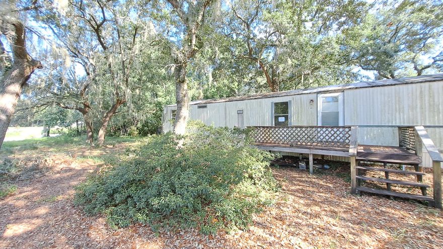 Nice piece of property on the corner of East Bay Blvd and Ranney Dr. Three bedrooms and two full baths. There is a ton of potential here. In close proximity to the public boat ramp and just a short drive to the white sandy beaches of Navarre.