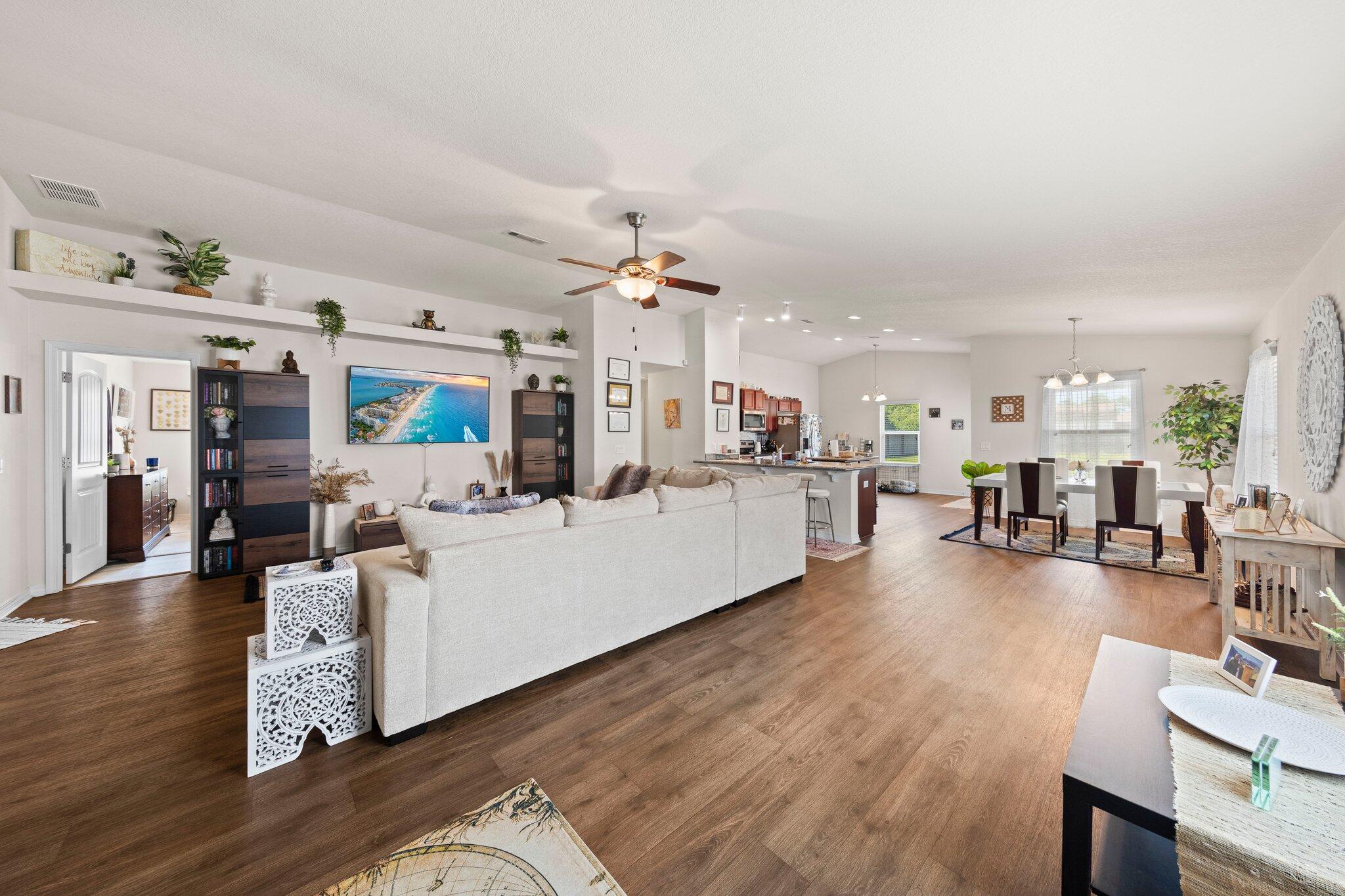 Nestled in proximity to the sun-kissed shores of Navarre Beach and the bustling activity of Hurburt Field, this contemporary gem beckons with modern allure and coastal charm. Built in 2017, this 3-bedroom, 2-bathroom abode boasts a sleek design and inviting ambiance. Step inside to discover a spacious open concept adorned with luxury vinyl flooring and vaulted ceilings, creating a seamless flow from the gourmet kitchen equipped with stainless appliances to the airy living and dining areas. The large master bedroom has a ensuite that offers a tranquil retreat, featuring a garden tub, separate shower, and a double vanity. Granite countertops grace not only the kitchen but also the bathrooms, adding a touch of elegance and durability to this coastal haven. Beyond the expansive interiors lies a sprawling yard, perfect for al fresco gatherings and outdoor festivities. With its ideal location and stylish amenities, this home embodies the essence of coastal living at its finest.