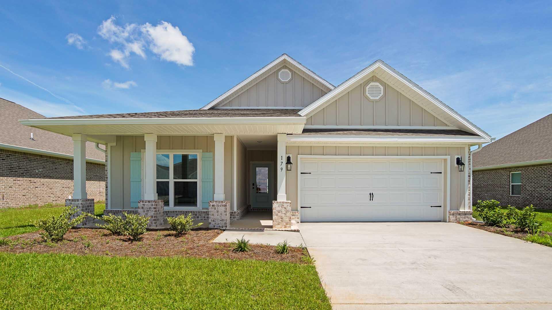 Welcome to 179 Gray Owl Drive, a new home at Owl's Head Farms in Freeport, Florida. This home has a large covered front porch and features four bedrooms and two bathrooms. As you enter this home, you will find a hall leading to a light-filled, open-concept living area with 9' ceilings. The kitchen is equipped with brand name stainless steel appliances and has been finished with elegant quartz countertops and beautiful white cabinetry. The center island has an undermount single basin sink and a dedicated water filter faucet and dishwasher as well as space for bar seating. Adjacent to the kitchen is the dining area while the living room's wide layout invites comfort and relaxation. The primary bedroom offers a serene escape with a luxurious bathroom featuring a double vanity, a walk-in shower, and two generously sized walk-in closets. Three additional bedrooms and a full bathroom are in a separate wing, ensuring privacy for family or guests. EVP flooring is Plank flooring throughout the home offering a seamless transition between rooms. The laundry room is located off the hall leading to the fourth bedroom and has space for a full-size washer and dryer.
The exterior of this home includes an oversized covered patio and two car garage with remote entry. All DR Horton homes have Smart technology including 5 DEAKO?? Smart Switches, Kwikset keyless entry and a programmable thermostat that can be controlled though an app on your phone. Contact us today to schedule your tour of this beautiful home.