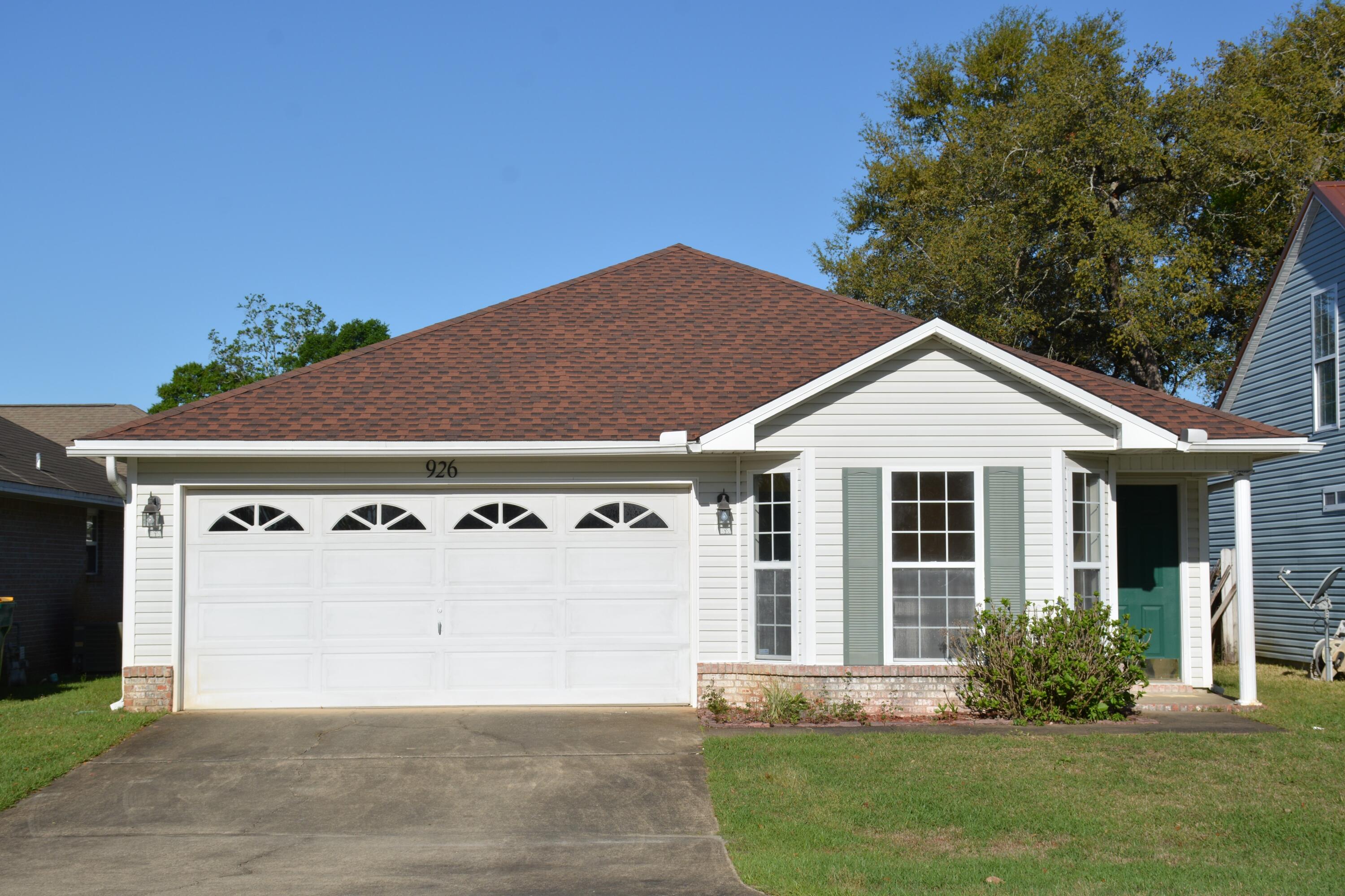 This quaint home is conveniently located in a lovely well maintained neighborhood in Fort Walton Beach. The Great room has a gas fireplace and features a vaulted ceiling that makes the area feel very spacious.  The kitchen is open to the great room and has a stainless refrigerator that was purchased within the last year. The dining room is adorned with wainscoting and has a bay window.  The master bedroom is large enough to accommodate a king-sized bedroom set.  The backyard has a patio and a privacy fence.  This home is only a few miles from the military bases and the white sandy beaches of the Emerald Coast. For the golfing enthusiast, there are many public golf courses in the area. The seller is offering a 1-year home warranty.  Buyer to verify all lot and home dimensions.