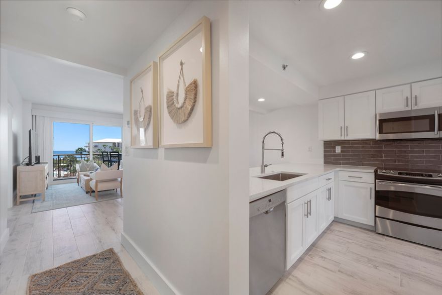 Remodeled and renovated in 2022, this classy 2-bedroom beach condo delivers spectacular unobstructed direct views of the Gulf of Mexico from the master bedroom, living room, dining room, and kitchen.  Plus, you get to enjoy your own private beach in a premier location conveniently tucked between Alys Beach and Rosemary Beach. The owners have carefully crafted this remodel with the astute 30A buyer in mind, with updates that include wood-look tile floors, new sliding glass storm doors, new vanities and light fixtures, recessed lighting, quartz countertops, and new coastal decor and furniture designed by Marisol Guillo.