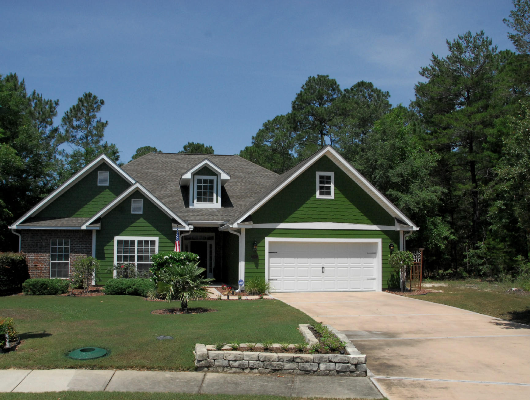 **CONTRACT CONTINGENT ON BUYERS HOME CLOSING** REDUCED PRICE! RARE WOODED SETTING IN HAMMOCK BAY! This beautiful 4 Bedroom home offers the best of both worlds. You will love the open, one level floorplan with arched doorways and many upgrades. This gem is also nestled at the end of a quiet cul-de-sac with only three homes due to a nature preserve located behind the backyard and wooded acreage on the side. Rhapsody Street is conveniently close to the entrance of Hammock Bay and is built out with no other construction except one home being completed at the entrance. Some of the upgrades include: freshly painted exterior; hardwood floors in main areas and kitchen granite countertops.