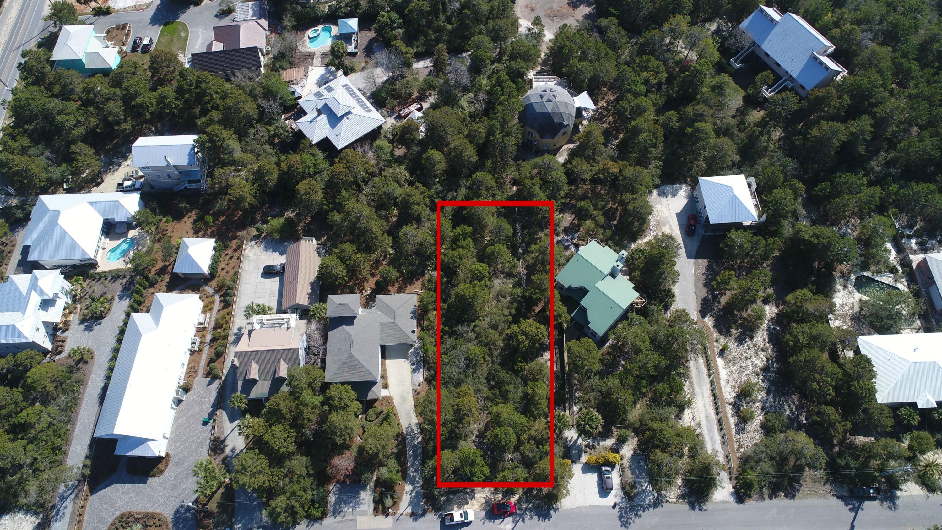 Large 65 x 215 lot available at one of the highest points in Blue Mountain! Rolling Dunes is a great stroll to the beach neighborhood with NO HOA! One of the last undeveloped lots in the area and located at the top of a hill providing the potential for fantastic Gulf views from upper levels and protection as well. This lot is located in an ''X'' Flood Zone, so no flood insurance is required. Four story and 50 foot height limit for construction. Rolling Dunes has no homeowner association fees! Great location, convenient to shopping and popular restaurants and just a short stroll to the beach, with a public beach access at the end of CR 83.