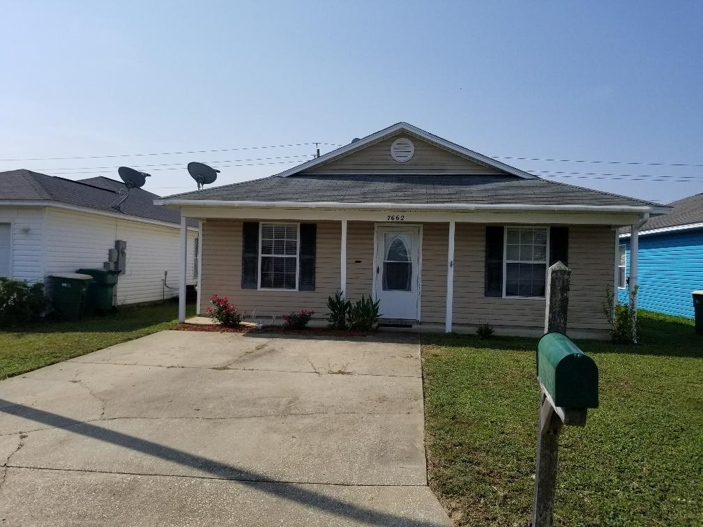 The Vineyard subdivision is tucked away. near the Navarre's white sand Beach and not far from Hurlburt AFB. Open floor plan with fenced yard. Seller pays closing cost with full price offer.