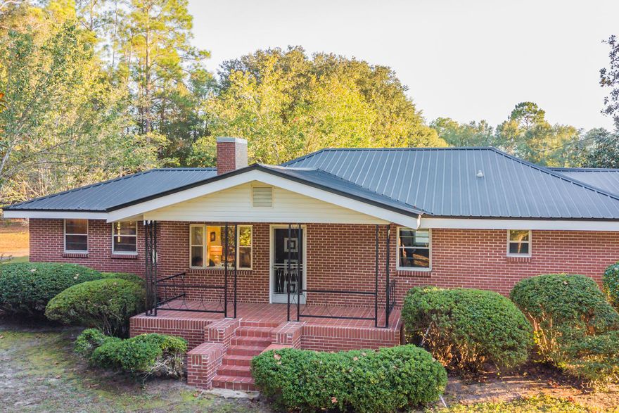 This property is a rare gem. Two homes, two detached garages and almost 14 acres of land. Gorgeous Pecan and Oak Trees. Pride in home ownership abounds in this meticulously maintained estate. The main home is almost 2220 sq ft, 4 bedrooms, 2 full baths, 2 living areas with a bonus room or 4th bedroom, Formal Dining Room, Interior Laundry Room, Full Unfinished Basement, Covered Front and Back Porch. New Roof in 2009, Newer Water Heater and Air Conditioner.The separate Mother In Law Suite is 1094 square feet. It features a brand new kitchen, 2 bedrooms, 1 full bath, newer water heater, newer metal roof, laminate wood flooring, fireplace, and covered front porch.