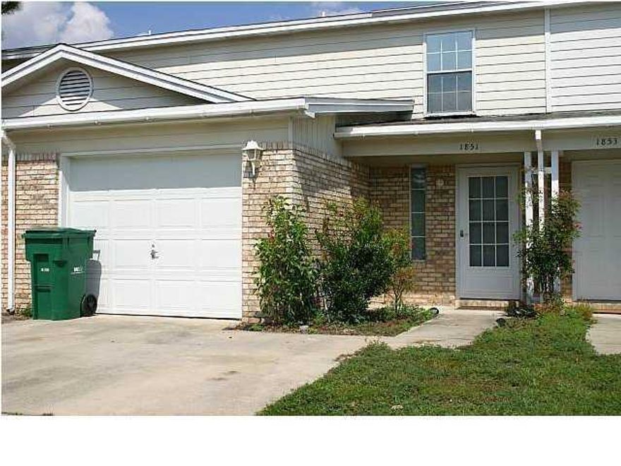 Spacious townhome convenient to both bases, shopping, restaurants and more. Downstairs features kitchen, living/dining room separated by a breakfast bar and convenient 1/2 bath for guests. The 3 bedrooms and 2 full baths are located on the 2nd floor. There is a small backyard with covered patio and privacy fence.