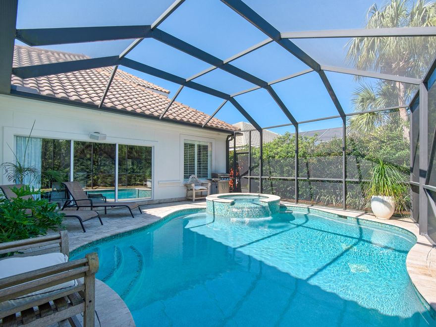 Stately upscale single family home within the gates of Destiny East. Step out to your screened lanai covering the large inground heated pool and spa. Lush landscape surrounds the home for the utmost in privacy. Perfect for large family gatherings, the main living areas are conveniently located on the first level. Chef's kitchen with double ovens, gas cooktop and two breakfast bars; let's get this party started! Master wing features fireplace, sitting area with doors to pool and spa bath. Optimal design for 2 families to enjoy privacy with bonus upstairs bedroom/den combo. Sold fully furnished and rental ready. Attached oversized two car garage for all your toys plus large driveway for additional parking. Meticulously maintained. See documents for improvements. Amenities include tennis and pickleball. Media Room. Gathering grill and bar area. Fitness center. Basketball and playground. Main pool withing gates, second pool on Scenic Gulf Drive across from beach.