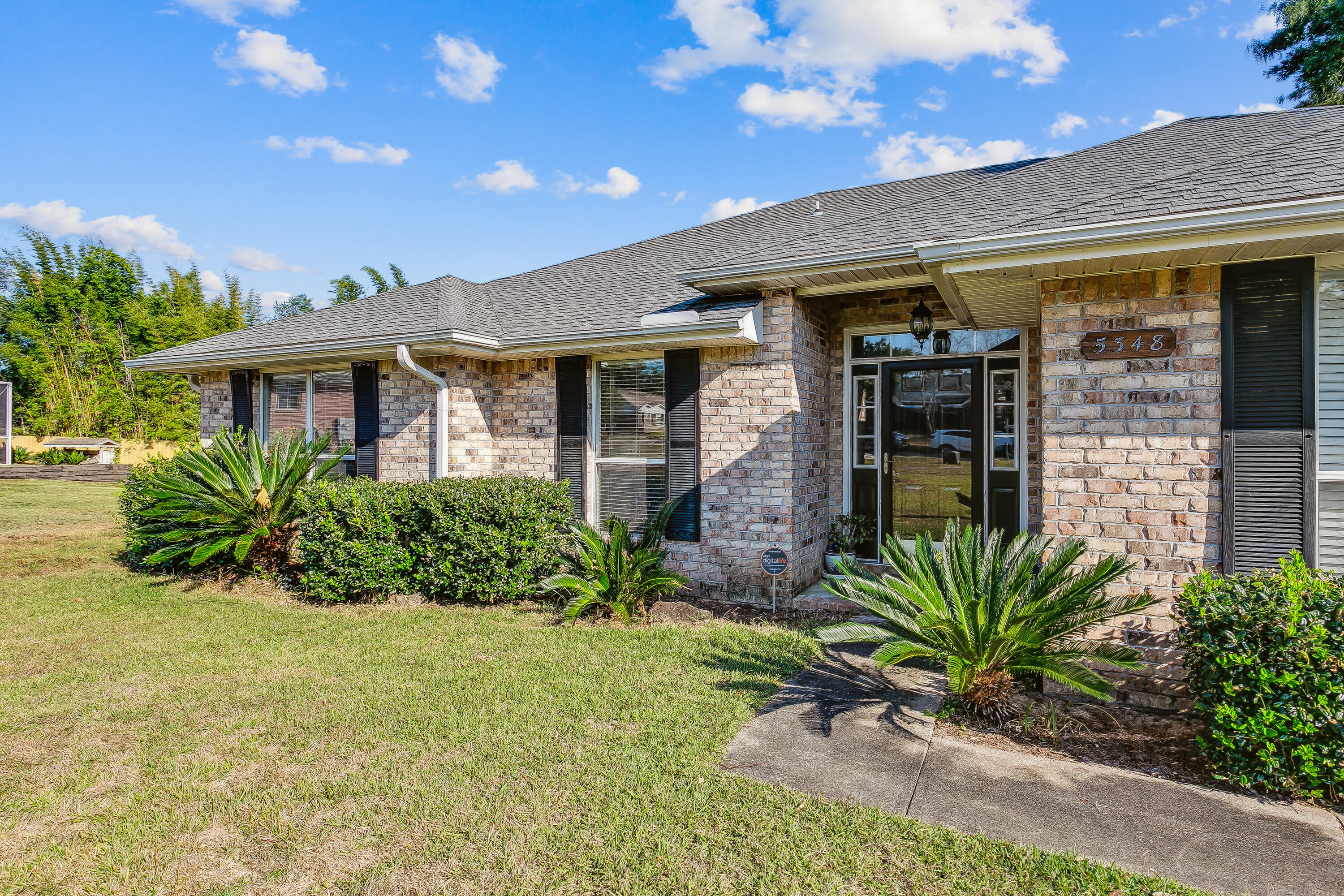 Beautiful 3 bedroom, 2 bathroom single story brick home in Oak Meadows subdivision. Located on a cul-de-sac, this neighborhood is great for families. The kitchen has a breakfast bar overlooking the dining area and living room, all stainless appliances, including a refrigerator with ice and water dispenser, and a smooth cooktop stove . The spacious living room has high ceilings, hardwood floors, ceiling fan and a wood burning fireplace. French doors open out to a large screened in patio with ceiling fan to enjoy sitting outside in the privacy-fenced backyard. Primary bedroom with a sizable walk in closet and in-suite bathroom with double vanity, garden tub/shower. Hardwood, tile flooring throughout with carpet in all bedrooms. Office space that could be used as an additional bedroom.
