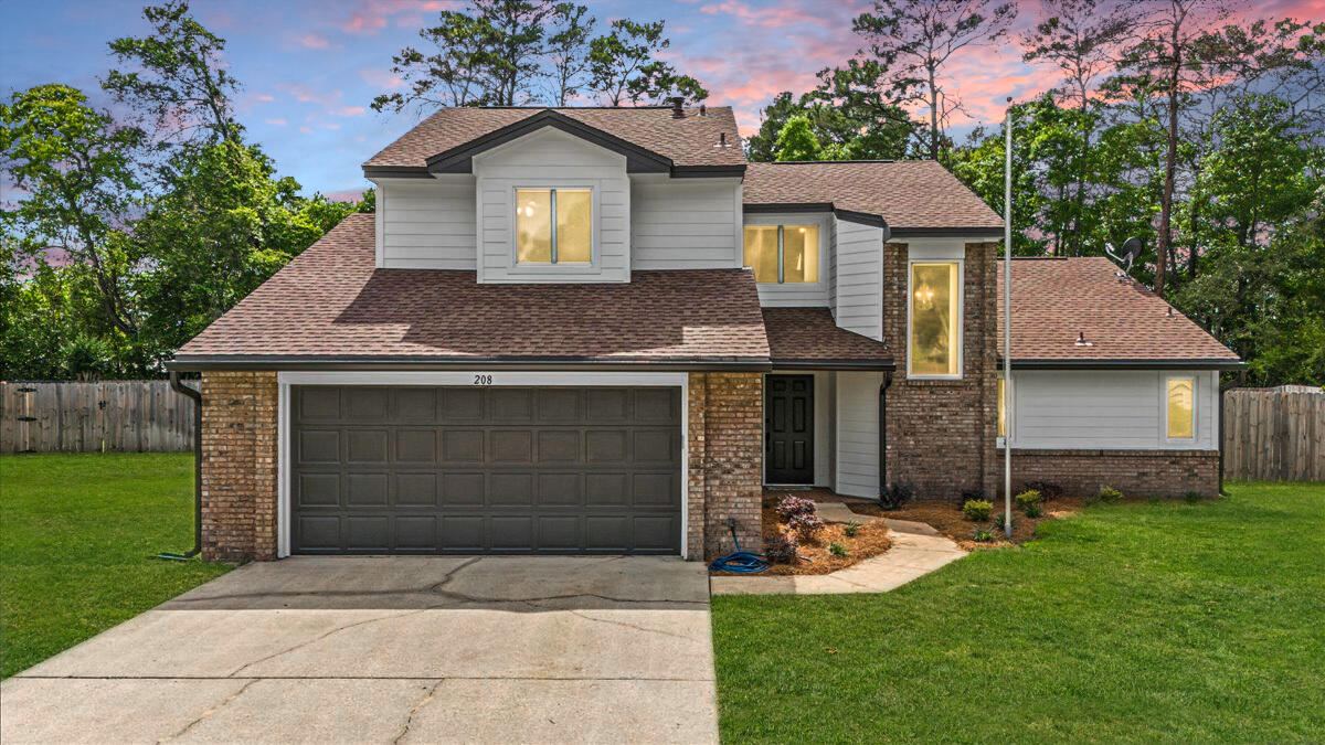 Welcome to this beautifully RENOVATED home located in the Rockywood neighborhood in Niceville on nearly a 1/3 acre lot with privacy fenced back yard. As you pull up, you'll notice it has been updated with a 2020 dimensional shingle roof. In 2024, the siding was replaced with durable hardi plank siding and soffits. There are also updated windows and sliding doors throughout. As you come inside, you will notice fresh paint as well as new carpet in all bedrooms and bonus area upstairs. The spacious living room offers a cozy fireplace and vaulted ceiling with skylights along with direct access to a sun-filled Florida Room that could be a multi-use space, 4th bedroom, office or playroom.The kitchen has been updated, featuring GRANITE countertops and backsplash, white cabinetry and new STAINLESS STEEL appliances.
The first-floor primary suite offers privacy, a walk-in closet and an updated bathroom w/ dual-sink GRANITE vanity, walk-in tiled shower, and a separate soaking tub.
Also located downstairs is a half bath, a laundry room, and an attached 2-car garage.
Upstairs, you'll find two spacious bedrooms and a fully remodeled bathroom complete with a new vanity, tub/shower combo with tiled surround, and new light fixtures.
Outside you'll find fresh landscaping, and a privacy-fenced backyard.
Water Heater (2025),
Roof (2020),
HVAC (2010).
Don't miss the attached list of upgrades for a full overview of the impressive renovations throughout this wonderful home.