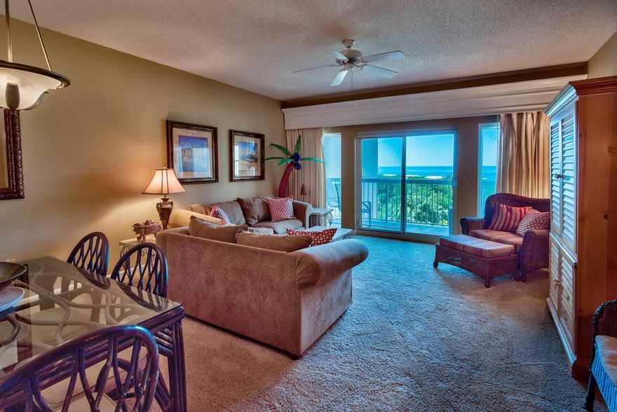 Imagine being on your private balcony at a world class resort overlooking Tops'l Hill Nature Preserve and the emerald green waters of the Gulf of Mexico. The Summit condominium sits atop a 34. ft. bluff, giving this 5th floor unit phenomenal views of the Gulf, Tops'l Resort and Four Mile Village. The interior offers an open and spacious floor plan and high ceilings. The unit is being sold fully furnished and decorated with room decor recently updated. The kitchen is renovated with beautiful granite countertops & breakfast bar and stainless steel appliances. The kitchen, living & dining area features breathtaking views of the Gulf, along with the master bedroom. The living area is open and cozy at the same time with a flat screen TV and direct access to the private balcony.