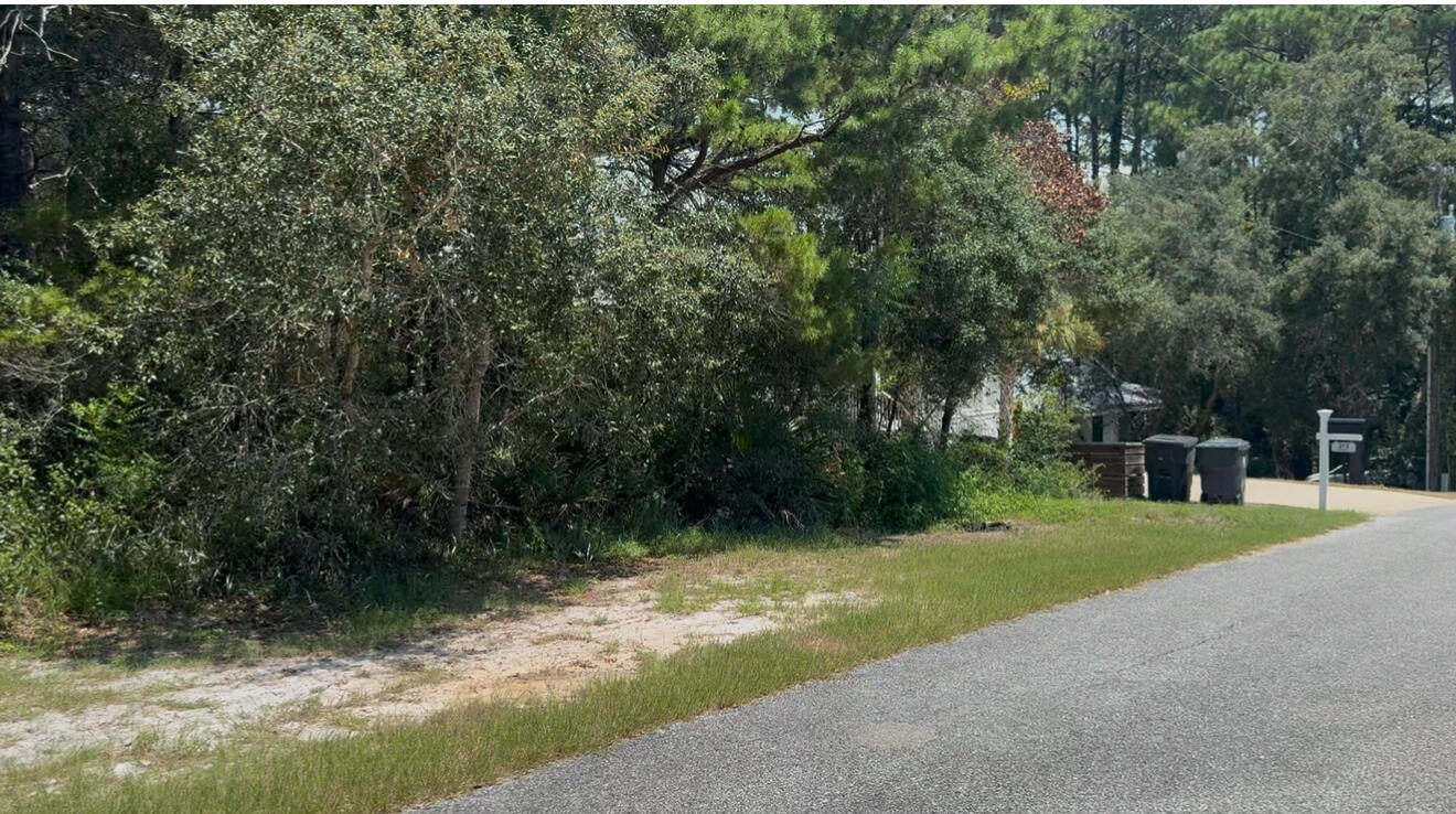 The vacant lot for sale in Gulfview Heights on 30A offers a unique opportunity to build your dream home in a serene coastal community. Spanning approximately 0.19 acres, this lot is nestled among lush vegetation and is just a short walk from the stunning beaches of the Gulf of Mexico. The area is known for its charming, laid-back atmosphere, with nearby access to local shops, restaurants, and outdoor activities. The lot's dimensions allow for a spacious design, whether you're envisioning a cozy beach cottage or a larger family home. With its proximity to scenic bike trails and the vibrant community of 30A, this property is ideal for those looking to enjoy both tranquility and the joys of coastal living. Don't miss the chance to invest in a prime piece of real estate.