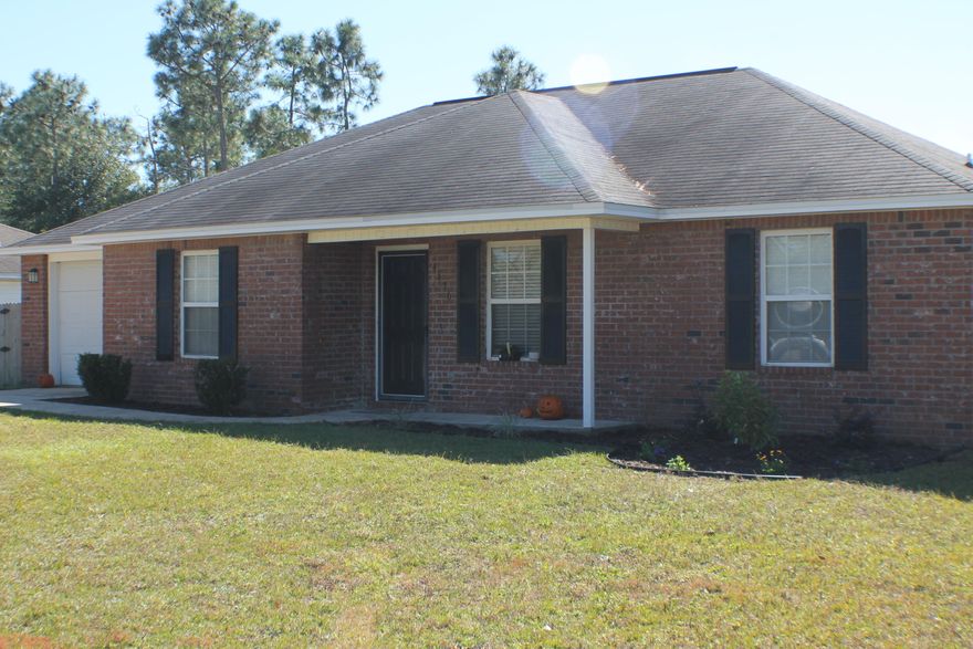 Beautiful remodeled three bedroom two bath home convenient located near Crestview! The huge eat in kitchen has a pantry and lots of natural light from a kitchen window sink ( so you can watch the kids) and a french door with built in blinds. Great access to local bases by 285 or quick connection to hwy 90 and I-10 ! Bring the family and the pets. New paint, carpet, laminate wood flooring ,stainless appliances! Fenced yard huge shed for storage for workshop! Come home to Dove Way Today!