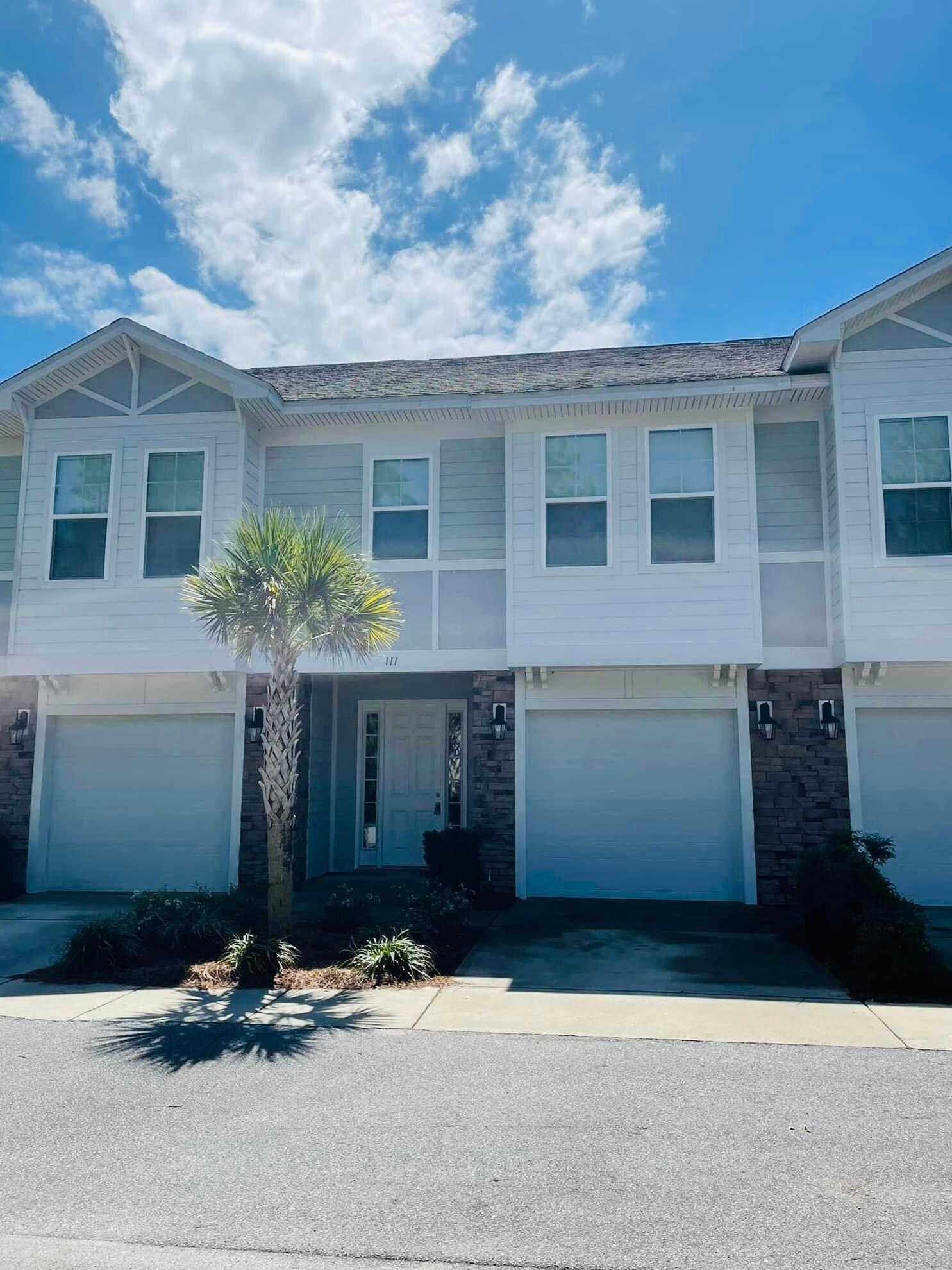 Welcome to the Waterfall Community! Tucked away off the main road & located only 1.5 miles to the beach. This townhome has a quiet location & a beautiful view of the conservation area from the front door. This spacious townhome offers a modern, open living space with 10' ceilings, beautiful granite countertops in the kitchen , luxury vinyl flooring, custom blinds & a half bath on the first floor. The second floor features the master bedroom suite with over-sized walk in closet & decked out master bathroom with walk-in tiled shower & large tub. The second floor also includes the additional two large bedrooms and full bathroom. The one car garage has plenty of space for a car & has built in shelving. One of the best amenities is the community pool which is set up for perfect Florida living!