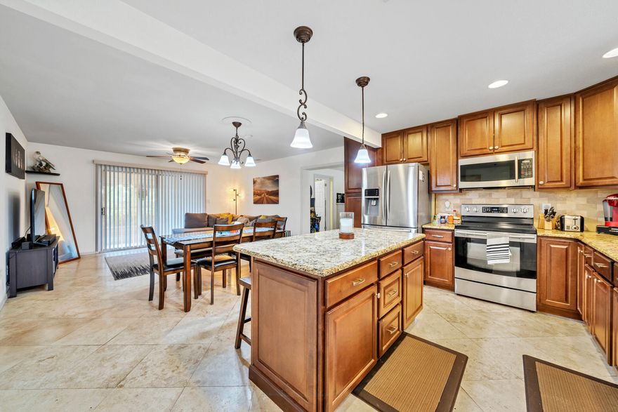 Great Location, with a public playground on the street.   The 3 bedroom home 2 bathroom is situated on a large corner lot with a fenced in back yard and shed.   The open floor plan is great for entertaining. There is a side den and a separate laundry room.   You can walk out into the wonderful screened in patio and enjoy your morning coffee.   The back yard has mature trees and landscaping with an amazing work shed.  There is a children's park with a playground on the street. The drive to the beach/board walk with restaurant is only 10 minutes.    New Roof in 2021, new Hot Water Heater in 2020. Buyer to verify room dimensions and pertinent details.