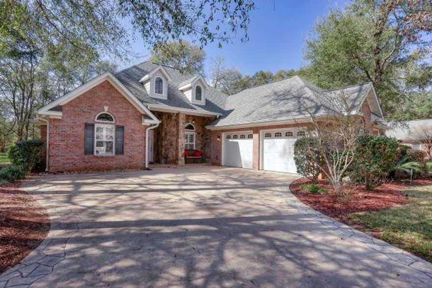 CUSTOM BUILT POOL HOME in an executive subdivision. One of the only GATED communities offered in Crestview with underground utilitites and beautiful landscaping. When viewing this property you will notice the high quality construction standard with open floor plan and quality upgrades to include over sized garage, hardwood flooring, stainless appliances, gas stove, screened in pool, lawn irrigation and low maintenance landscaping. This beautiful neighborhood is tucked away among the shady live oak trees minuets from schools, groceries and shopping. Don't delay, call today to schedule a showing.