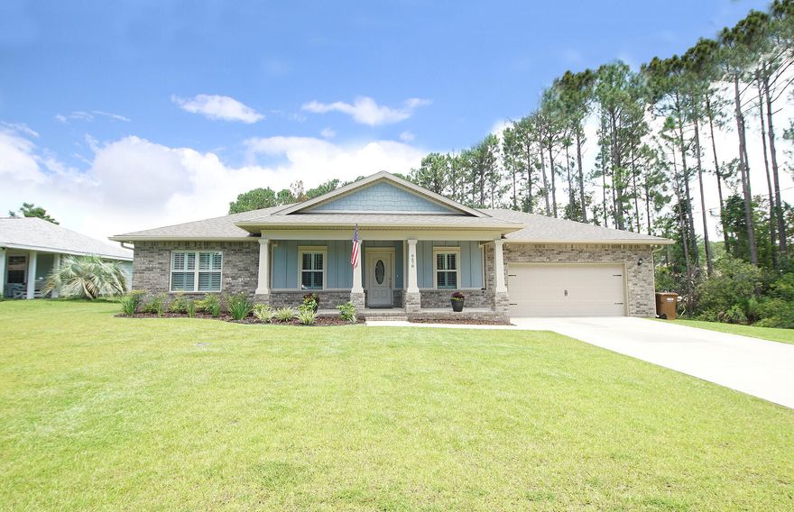 **Better than New** FL living done right! Custom craftsman Pool Home w/ exceptional amenities! Gorgeous modern 5-Bedroom 3 bath perfect for entertaining friends and family! Located on a beautiful family friendly street just 1 MILE to Navarre Beach and 10 miles to Hurlburt field.This split floor plan brick home features Wood look ceramic tile flooring, crown-molding & Plantation shutters. The oversized kitchen has plenty of space w/ custom solid wood cabinets, under cabinet lighting, granite, tray ceilings, & high-quality Stainless Steel appliances. Spacious Master Bedroom features double tray ceiling w/ up glow lighting & crown molding. Master Bath has a large tile shower & soaking tub w/ tile surround. Gutters, Privacy Fence w/ Sprinkler System, Lanai & more! Call today for a showing!