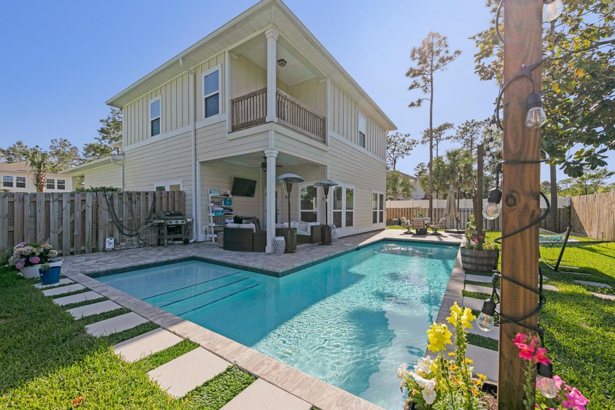 Have you been searching for a large home in a community that does not allow short term rentals. Welcome to Mussett Bayou Manor! Cobble stone driveways and sidewalks add to the charm of the quiet community with only 17 homes.   Coming soon a community dock and gazebo on Musset Bayou which leads to the bay. This home has its own pool with lounge area. Gas heater for those who prefer warmer water. Inside enjoy entertaining in the open concept first floor. The kitchen includes gas cooktop,  wall oven/microwave combo, walk-in pantry and oversized L shape island with seating for 6. Living room and dining area off the kitchen.  9 foot ceilings and tall windows allow for natural light. Upstairs you will find the large master suite with trey ceiling,walk in closet, private balcony and bathroom with walk-in shower and garden bathtub.  3 additional bedrooms, 2 full bathrooms and spacious laundry room complete the second floor.  Conveniently located near beaches, shopping and dining.
