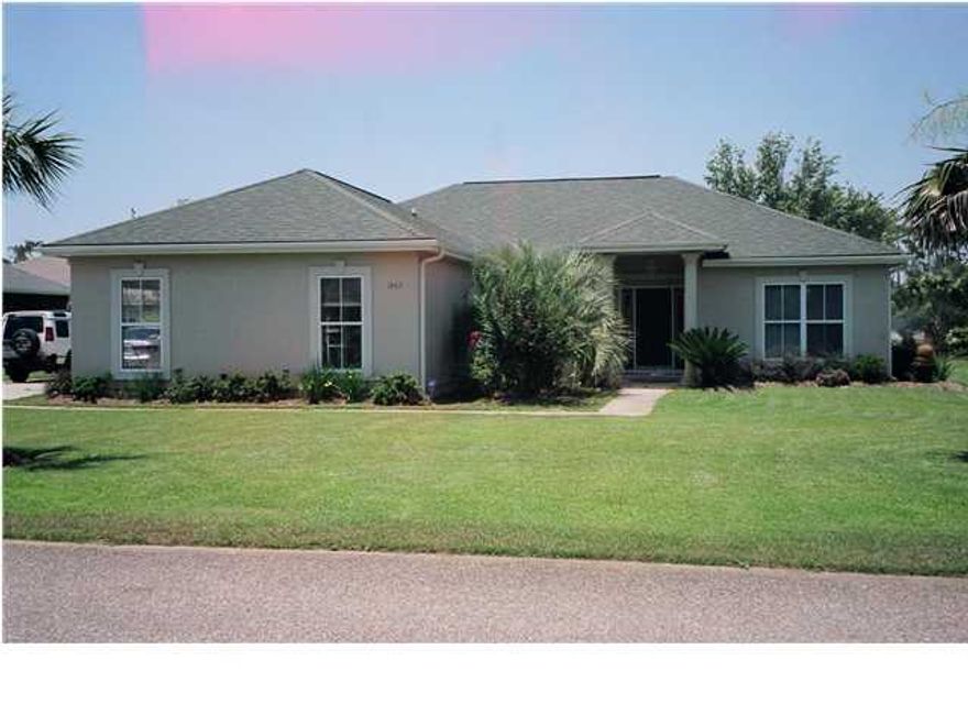 This is a beautiful home. Lush landscaping with a lawn pump and sprinkler system! The dining room could be used for an office/den or even a 4th bedroom. New ceramic tile throughout! Lots of built in shelving, gas fireplace, lanai, cathedral ceilings, kitchen features glassed cabinetry, wine rack, microwave, side by side frig, eat in area, neutral colors. Deeded water access! And you've got to see the master bath! Small pet may be considered with approval of owner and a $300 non-refundable pet fee. This home requires water, electricity and gas. No smoking allowed inside home or garage.