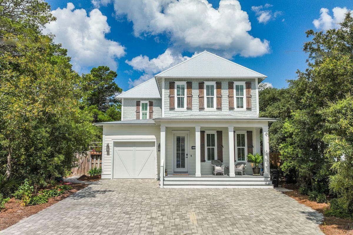Ideally situated south of 30A within walking distance to the beach, this custom-built home offers luxury beach living with no HOA fees! The fully privacy fenced backyard is an oasis complete with a private pool with sun shelf and chaise lounges, and a hot tub. Outdoor dining and entertaining is effortless with the screened porch and outdoor kitchen. Inside, the first floor features a spacious guest suite and an open concept kitchen with a gas stove and center island. Upstairs, the primary suite has it all: a walk-in closet, a private screened balcony overlooking the backyard and pool, and a private ensuite bath with a dual sink vanity, an oversized walk-in shower, and a soaking tub. An additional guest suite, kids' bunk area, and attic access round out this functional beach home