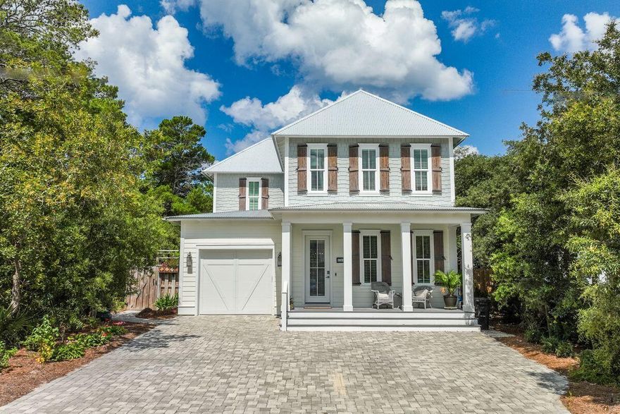 Ideally situated south of 30A within walking distance to the beach, this custom-built home offers luxury beach living with no HOA fees! The fully privacy fenced backyard is an oasis complete with a private pool with sun shelf and chaise lounges, and a hot tub. Outdoor dining and entertaining is effortless with the screened porch and outdoor kitchen. Inside, the first floor features a spacious guest suite and an open concept kitchen with a gas stove and center island. Upstairs, the primary suite has it all: a walk-in closet, a private screened balcony overlooking the backyard and pool, and a private ensuite bath with a dual sink vanity, an oversized walk-in shower, and a soaking tub. An additional guest suite, kids' bunk area, and attic access round out this functional beach home