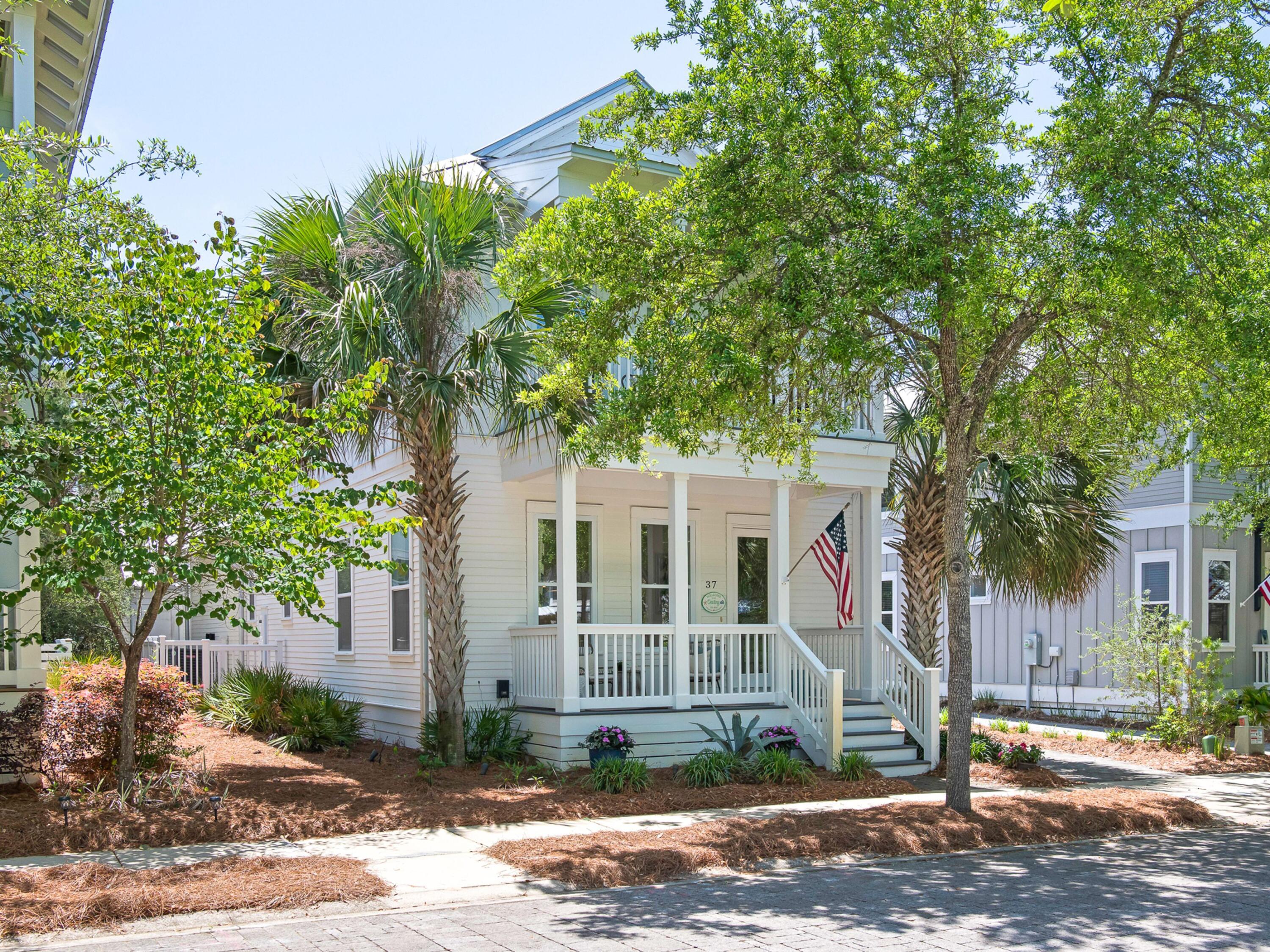 LOCATION, LOCATION, LOCATION!!!Welcome to this stunning four bedroom, three and one half bathroom home nestled in the charming, private, gated community of Greenway Park. In the very heart of Seagrove Beach this home is just a short walk or bike ride to the beautiful, sugar white sand beaches of 30A.A study in craftsmanship, the home features crown molding, custom trim, pine wood flooring throughout, and 10-ft. ceilings on the main level. Carrara marble counters, Timberline cabinetry, and lcynene insulation throughout speak to both luxury and efficiency. Custom drapes in the family room and dining room, with plantation shutters in all bedrooms and bathrooms. Two Master bedroom suites, one upstairs and one downstairs, enhances livability and flexibility. Enter directly to an expansive open floor plan, combined dining room, living room, and kitchen with a large island, ideal for family gatherings and entertaining. This is where memories are made. The kitchen is equipped with stainless steel appliances, gas stove, and beautiful tile backsplash. Tucked away in the rear of the first floor is your private, first floor master suite and master bathroom with a double marble vanity and a frameless, glass shower. Upstairs you will find the second master bedroom suite with bathroom, that opens out to a peaceful balcony. Two additional guest bedrooms and full bathroom complete the second floor.
The exterior features include a spacious porch perfect for morning coffee, an upstairs balcony, and a brick paver driveway that expands to an outdoor grill and seating area. Enjoy a quick, refreshing rinse from the outdoor shower after a sunny day at the beach, a shed that has adequate storage for all of your beach, sports and gardening equipment. The home includes a long lasting, durable metal roof and gutter system.
The sought after community of Greenway Park is known for its charming pavered streets lined with a mature oak tree canopy, and a community pool with an expansive deck that is perfect for relaxing under the sun. Convenient and a short stroll to Greenway Station, an upscale destination that offers a variety of dining options, a coffee shop, an ice cream shop, an art gallery and boutique shopping.
This home is perfect, whether you're looking for a family home, a vacation retreat or rental/investment property. This home has never been rented and remains in pristine condition.