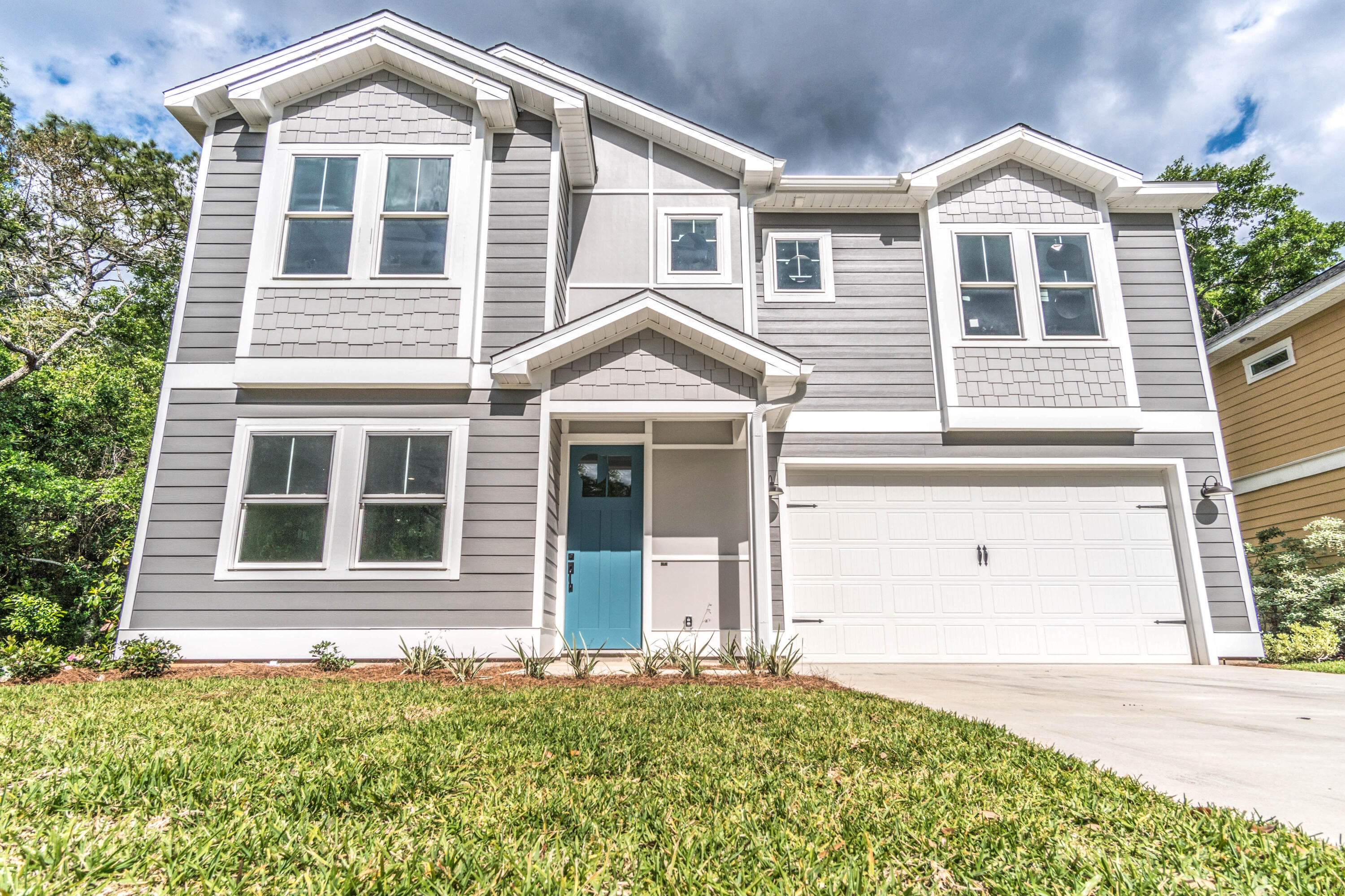 Welcome home to your new home in Niceville! Brand new ready for move in craftsman style single family home in close proximity of Turkey Creek park. Located only 4.4 miles from Eglin AFB and a quick commute to Hurlburt AFB and Duke field. Also, a short drive to the Mid-Bay bridge leading to white sandy beaches of Destin. This home features a two car garage with driveway parking. The first floor with open concept and Luxury Vinyl Plank flooring. Kitchen features a refrigerator, stove, dishwasher and microwave. Upstairs features 2 bedrooms with a full bathroom along with a perfectly sized master bedroom with double vanity on-suite and beautifully tiled shower.
