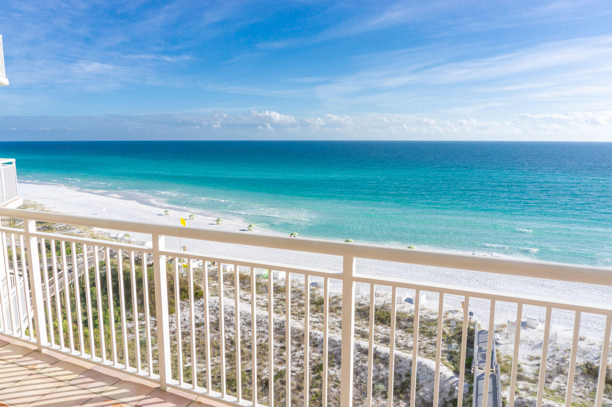 Rare rental restricted gulf front condominium makes a fabulous primary or secondary residence! Wrap around covered balcony offers generous panoramic views of the gulf all the way to Pensacola and Appalachicola.Built in grill and cooking area on the balcony conveniently accessible by the kitchen window that slides open similar to a balcony door, making it easy to pass food and cooking utensils back and forth. The functional floor plan has a bathroom for each bedroom and the master bedroom is on one side of the living space while the other 2 bedrooms share the other side. Master bedroom boasts it's own gulf front balcony access and gorgeous gulf views. This unit showcases the beach with a view of the gulf from almost every room.