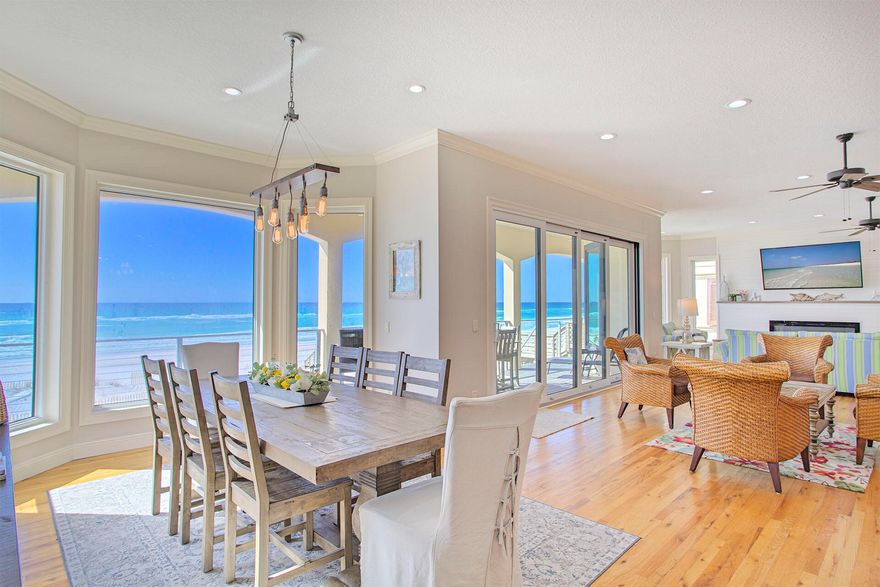 Back on market due to buyer default. This luxurious vacation home is a two story beachfront beauty located on the sparkling white sand beach of Destiny Shores. Featuring five spacious bedrooms, this beach house comfortably accommodates up to 12 guests. There has been a major remodel completed in the last 3 months. The spacious living area has a wall of windows providing exceptional views of the emerald waters. The large open Great Room has gleaming hardwood flooring with two areas set aside for conversations and entertainment. Open state-of-the-art kitchen has stainless steel appliances and a long granite countertop that seats five or more. The cooktop is in induction. One of the beautifully appointed King suites is on the first level with access to its own private luxurious bath.