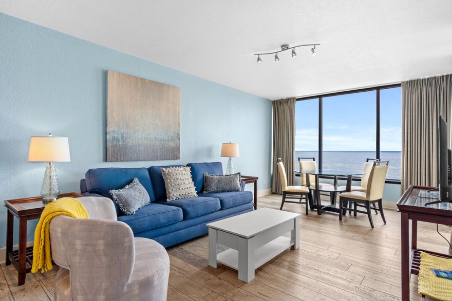 This fully updated full 1BR-1BA bay front condo at Bayside Inn, Sandestin Resort is newly decorated in 'beach chic' style.  The location is perfect - adjacent to the Bayside Conference Center, the Linkside Conference Center and the Linkside Golf Course. Be sure and check out the photos of the full size balcony with gorgeous views overlooking the Choctawhatchee Bay.

So much to enjoy! Spend an afternoon lounging by the sparkling blue infinity swimming pool that overlooks the bay. There is a poolside tiki bar and grill, and the beach is a five minute drive away with plenty of beachside parking. Tram service will transport you to the beach or the Baytowne Wharf.