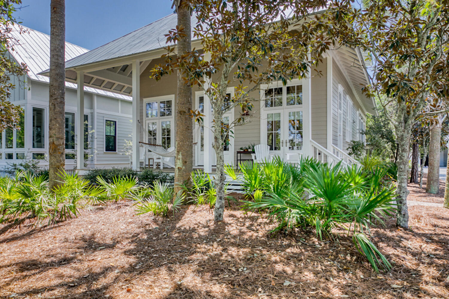 This home has been completely remodeled to show off the vaulted ceilings and a kitchen/dining area that is built for entertaining. The spacious private Master bedroom has a remodeled en suite bathroom with a soaking tub for relaxing baths. As you go upstairs you will be greeted by a Juliet balcony and 3 bedrooms, one with built in bunks. This home features a large porch which overlooks the community green space. This home is in the amazing Cypress Dunes subdivision, located on the West end of 30A (south side).  This home is conveniently located just down the street from the pool and amenity center. Cypress Dunes is a gated community that borders Topsail Hill State Park and Preserve. The community has 2 pools with one being a large infinity edge which overlooks the Gulf of Mexico.