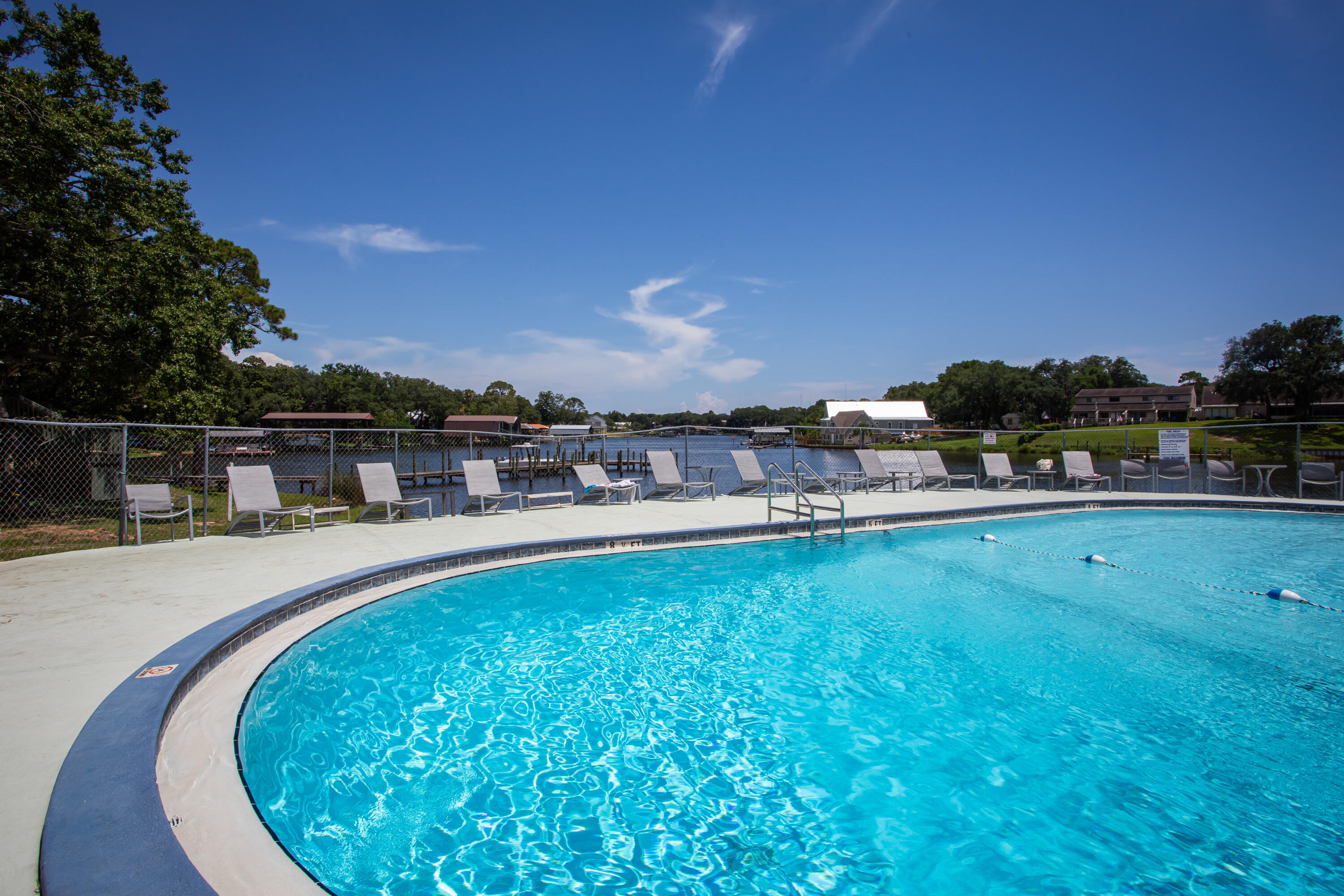 Welcome to this prime waterfront community located in Fort Walton Beach, FL! This unit has just been freshly painted, new bathroom vanities, faucets, mirrors, lights, wall paper removed, and guest bath tub redone. This condo offers a fantastic investment opportunity, or perfect for a primary or second home getaway. Situated in an ideal location, you'll have easy access to shopping, restaurants, local amenities, including a 7+/-minute drive to the nearest boat ramp, 15+/- minutes to the stunning Gulf of Mexico beaches, and less than 10 minutes to downtown. For those in the military, this property is conveniently situated 5-7 miles from Hurlburt Field & Eglin Air Force Base, making it an ideal location for military personnel. Additionally, this property is VA approved, providing an..... excellent opportunity for eligible buyers. As part of the waterfront community, you'll have access to Cinco Bayou, a community dock, and boat slips available on a first-come, first-serve basis. The community also offers a beautiful pool overlooking Cinco Bayou, a recreational room, laundry facility and tennis courts for your enjoyment. Parking space is available, and the HOA covers various expenses such as water, sewer, trash, exterior insurance, pest control, landscaping, and ground maintenance, providing you with ease of ownership. This particular unit offers great potential and only requires a little TLC to bring it back to life. With tile floors throughout, maintenance is a breeze. It's worth noting that out of the 138 units in this community, there are only 8 of the larger 3-bed, 2-bath units available, making this a rare find. Recent upgrades made by Pier One include a new marina, renovated pool with new patio furniture, ongoing upgrades to the tennis courts, a redone parking lot, and replacement of all stairs for all buildings. The laundry room has also been updated with new machines. Don't miss out on this incredible opportunity to own a piece of this waterfront community. Contact us today to schedule a viewing and see the potential this property holds.