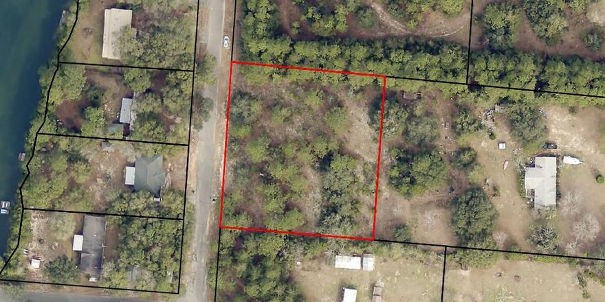 ..Looking for a Great '' Homestead Adventure''.. 1 Acre Property with a view of the Lake.. High & Dry Beautiful wooded , w/ cleared area, Property is located on the hill overlooking Nichols Lake. NOT RESTRICTED BY AN HOAproperty is zoned AG/RR, agricultural/rural residential. Owner was told by zoning office: no minimum square footage, it can be mobile or site built home, can have horses, cows, chickens, etc. It just has to have a working kitchen / bathroom, and utility hookups for a washer and dryer.The is a public swim area on the other side of Nichols Creek Road .  ***Buyer is responsible for personally verifying details about this property. Any information contained in this listing is believed to be accurate but is not guaranteed.